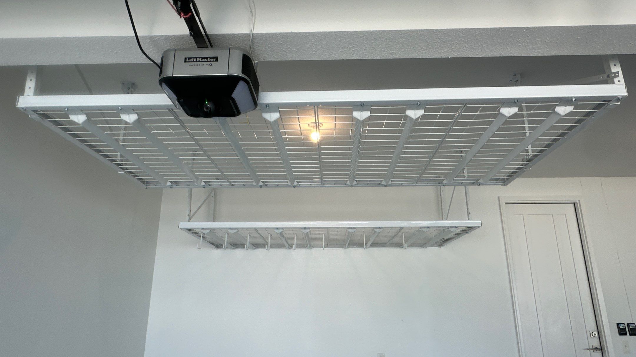 Kendel O. added overhead racks to their garage  by Banner Garage