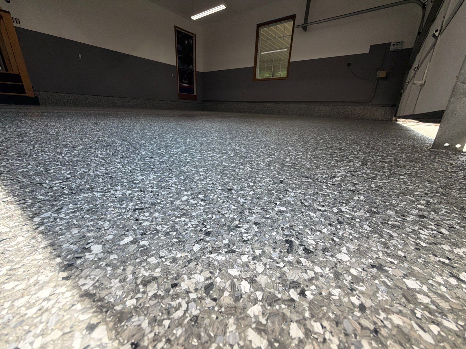 Weathered Gray Epoxy Flake Floor Installation in Muskegon by Gordon Painting