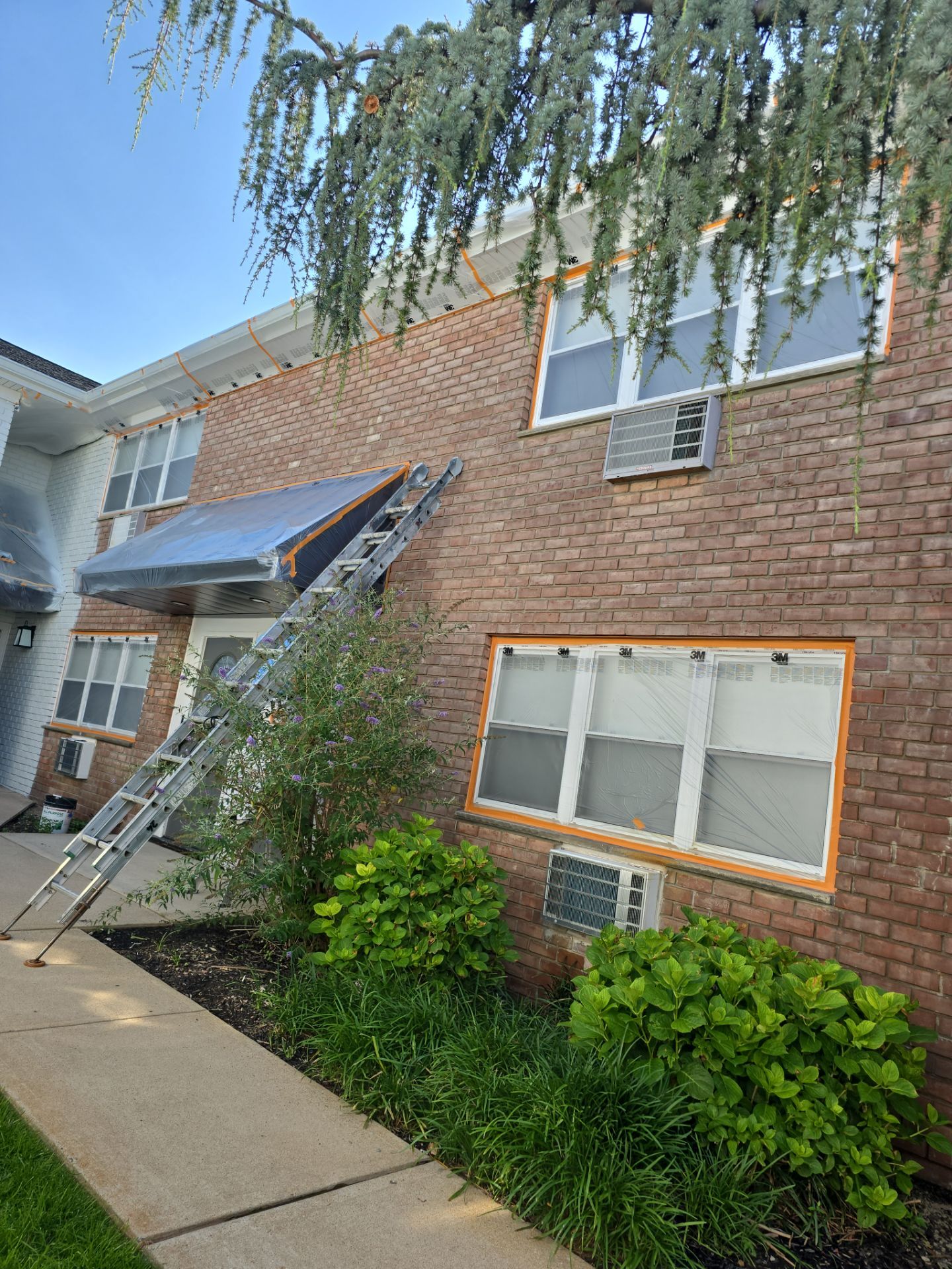 Multi-Unit Apartment Complex Exterior Brick Painting Project in Hackensack by Spectrum Painting, LLC
