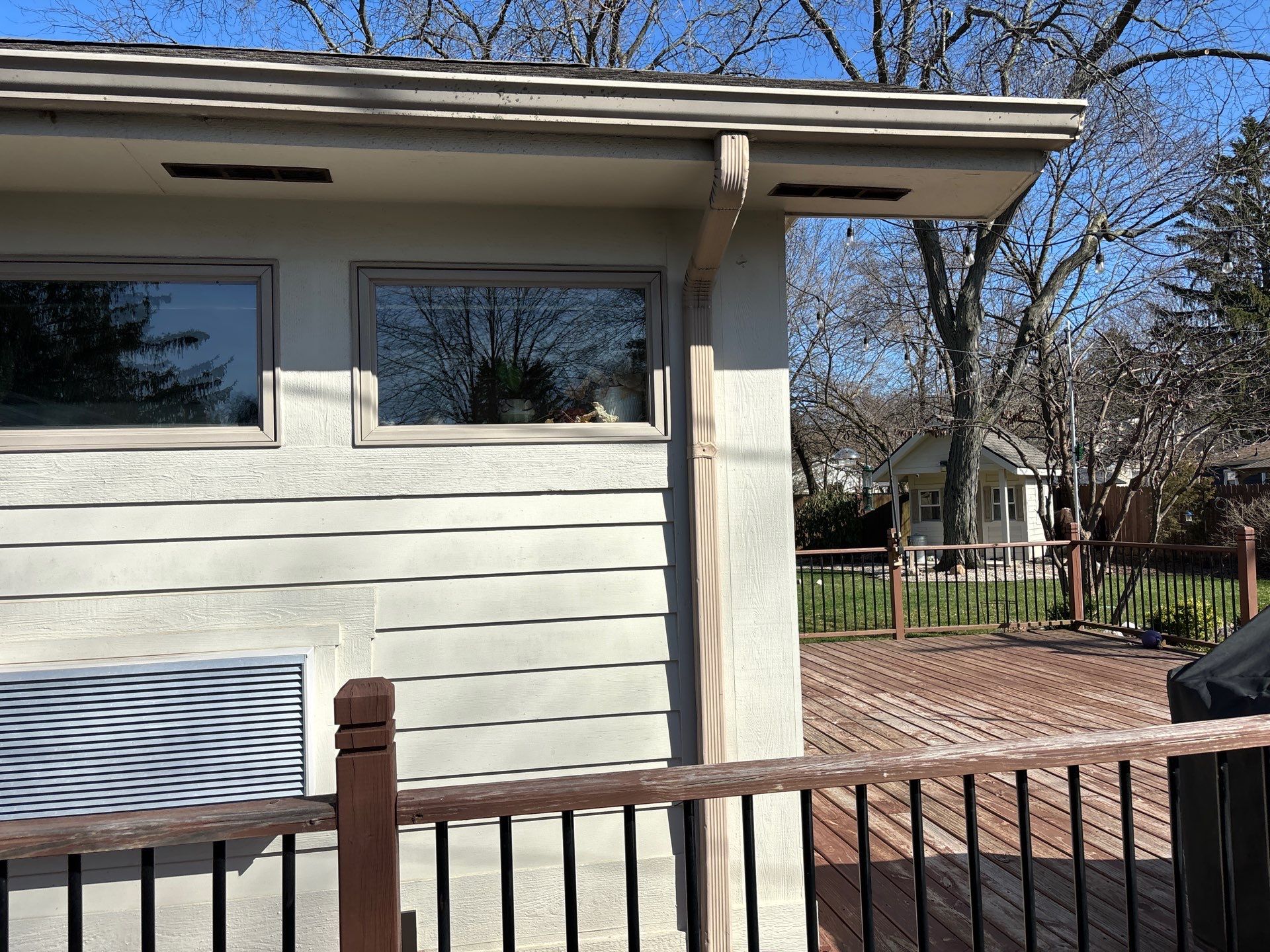 Installing new Roof, Fascia, Soffit, and Gutters. New custom trim around garage door. by Acme Exteriors