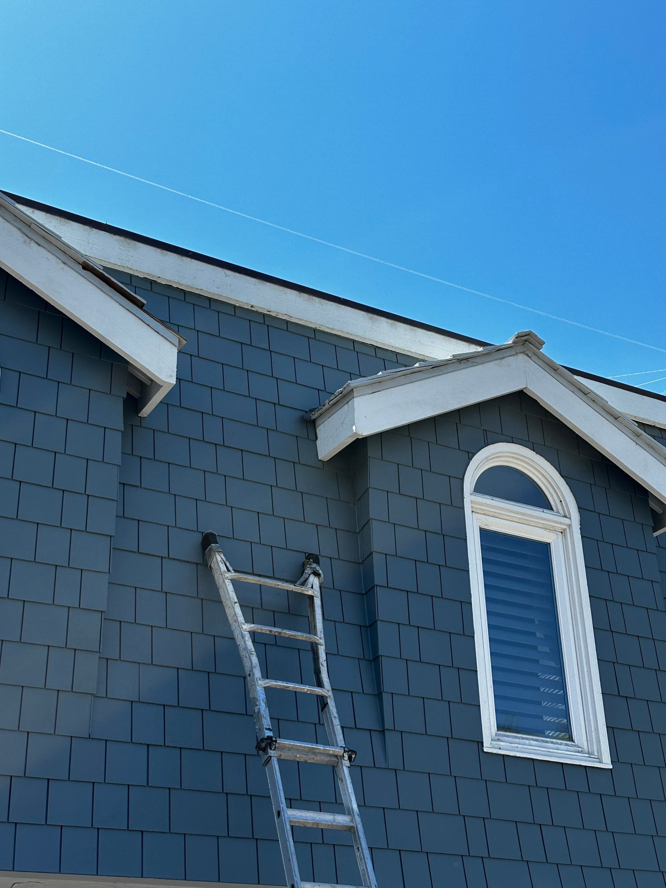 Pre-finish shingles by New Era Siding Inc 