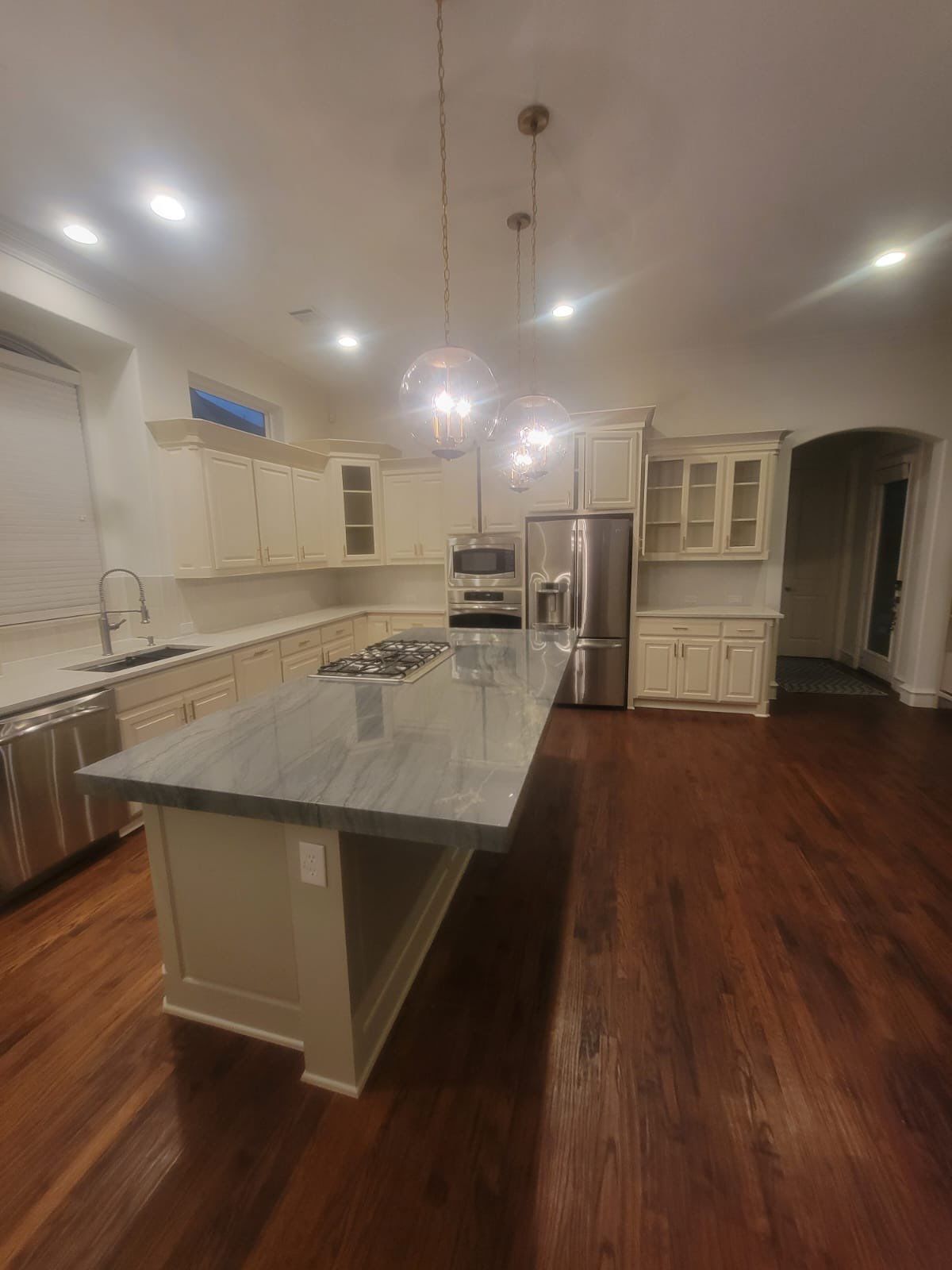Kitchen Remodel using Quartzite by SLM General Contractors & Roofing