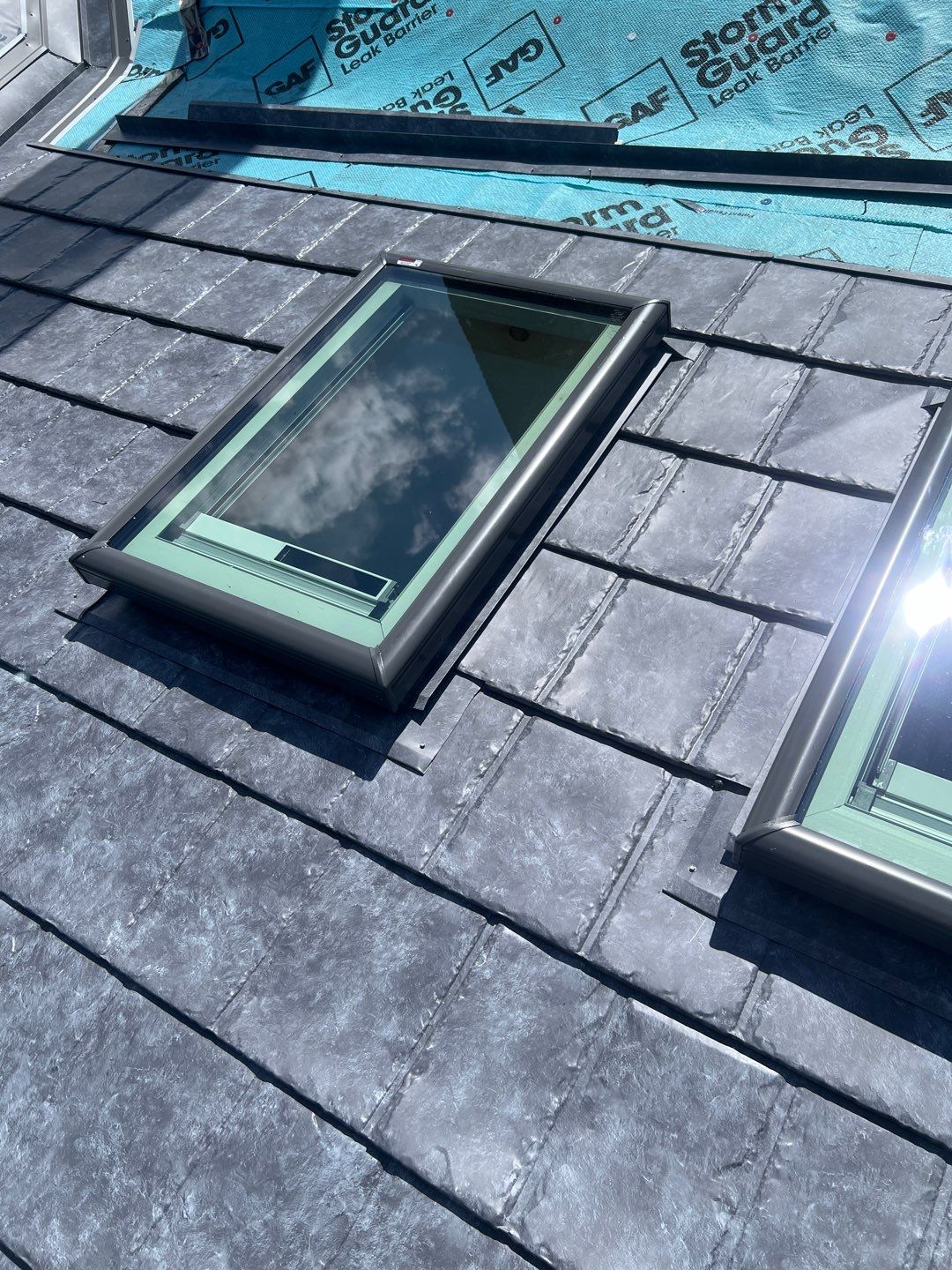 Residential Roofing Installation using ProVia Ironstone Slate Metal Roofing by RoofX 