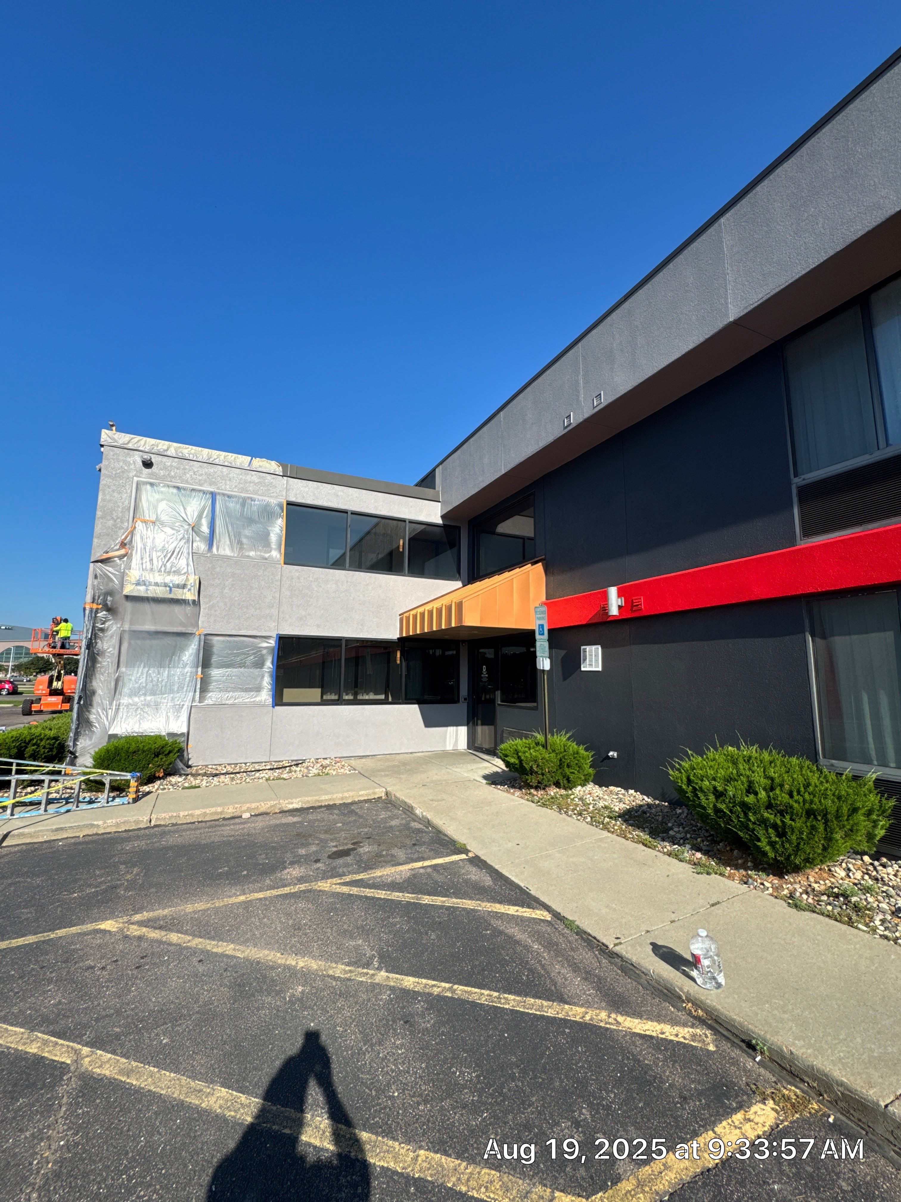 Commercial Exterior Painting with Stucco and Bold Red Accent Trim by Select Painting, Coatings & Garage Cabinets