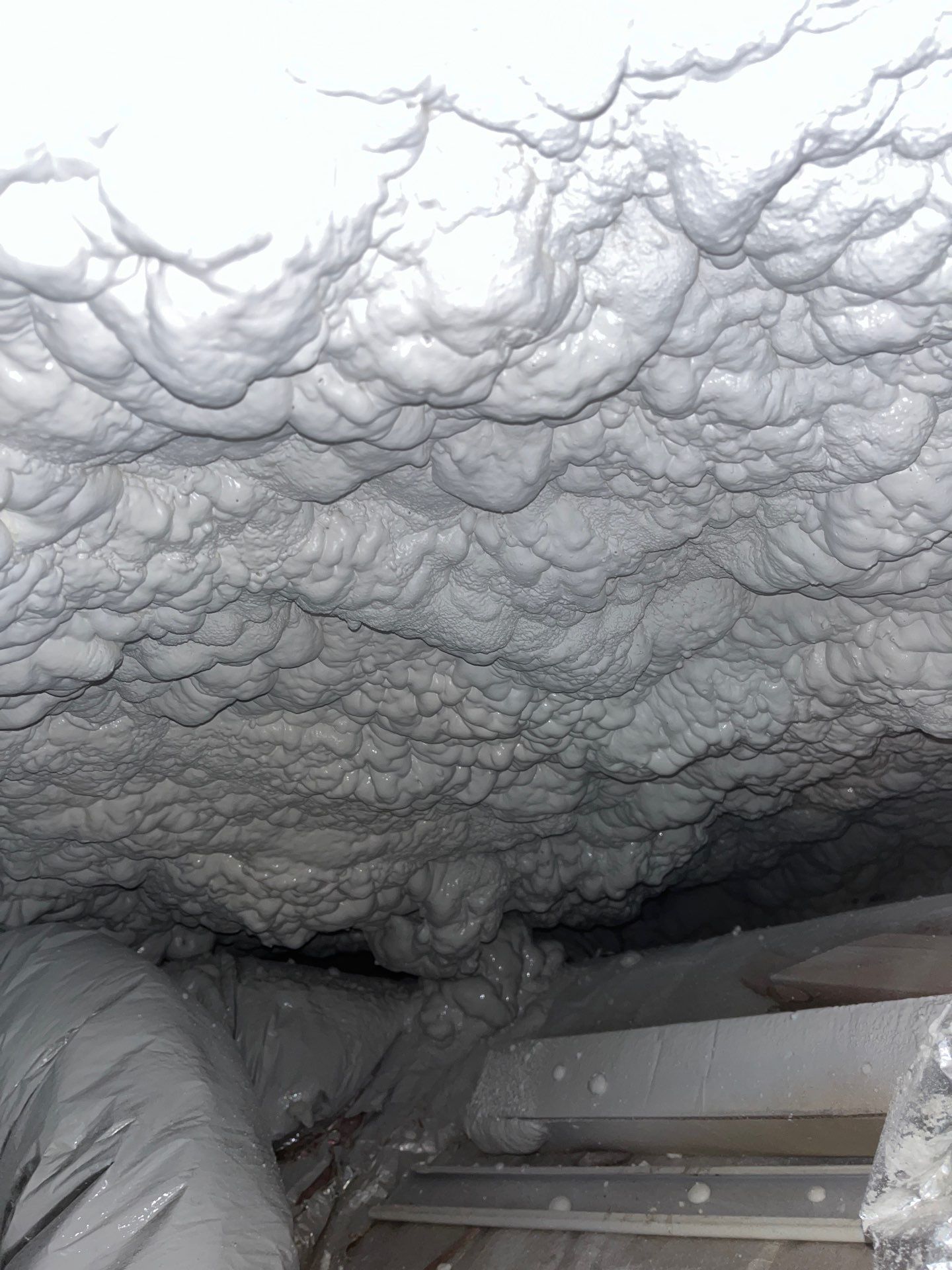 Attic Insulation using open cell spray foam by NYS Foam & Energy