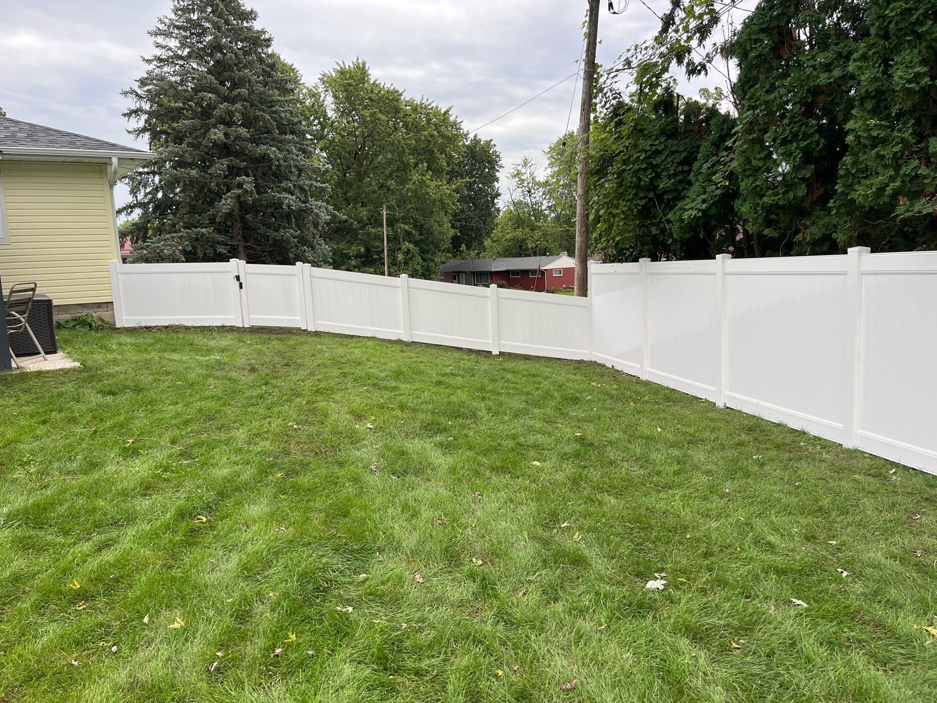 New White Vinyl Privacy Fence and Gate Installation in Waterloo by Perfect Picket Fence and Stain