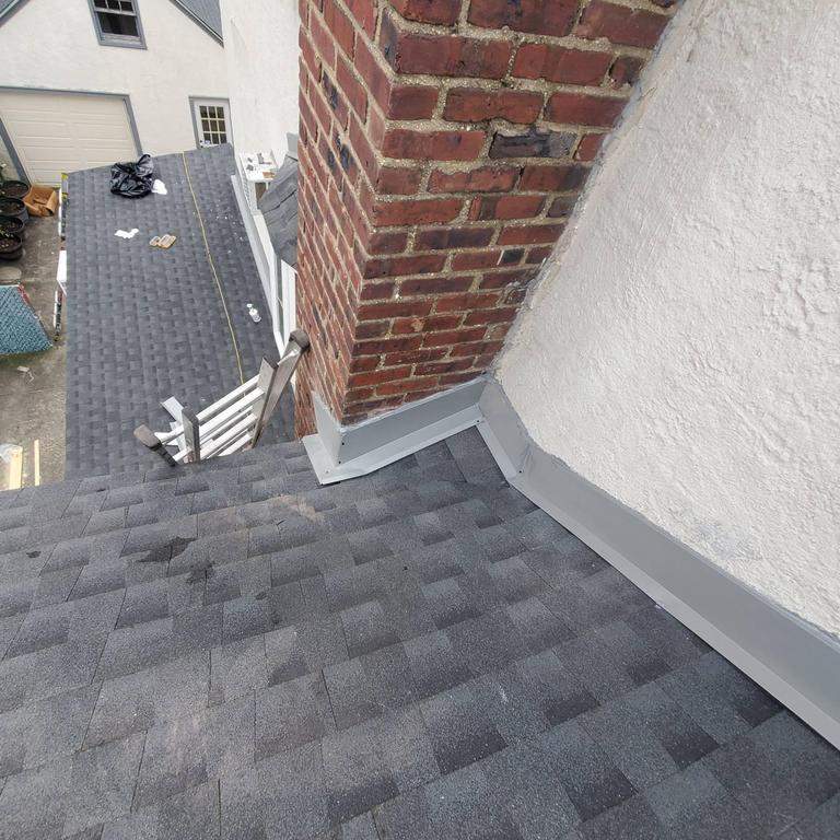 New Roof & Gutters by Island Roofing Inc.