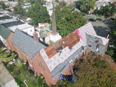 Owens Corning Duration® Shingles – Estate Gray, 6” Seamless Commercial-Grade Aluminum K-Style Gutters – Brown