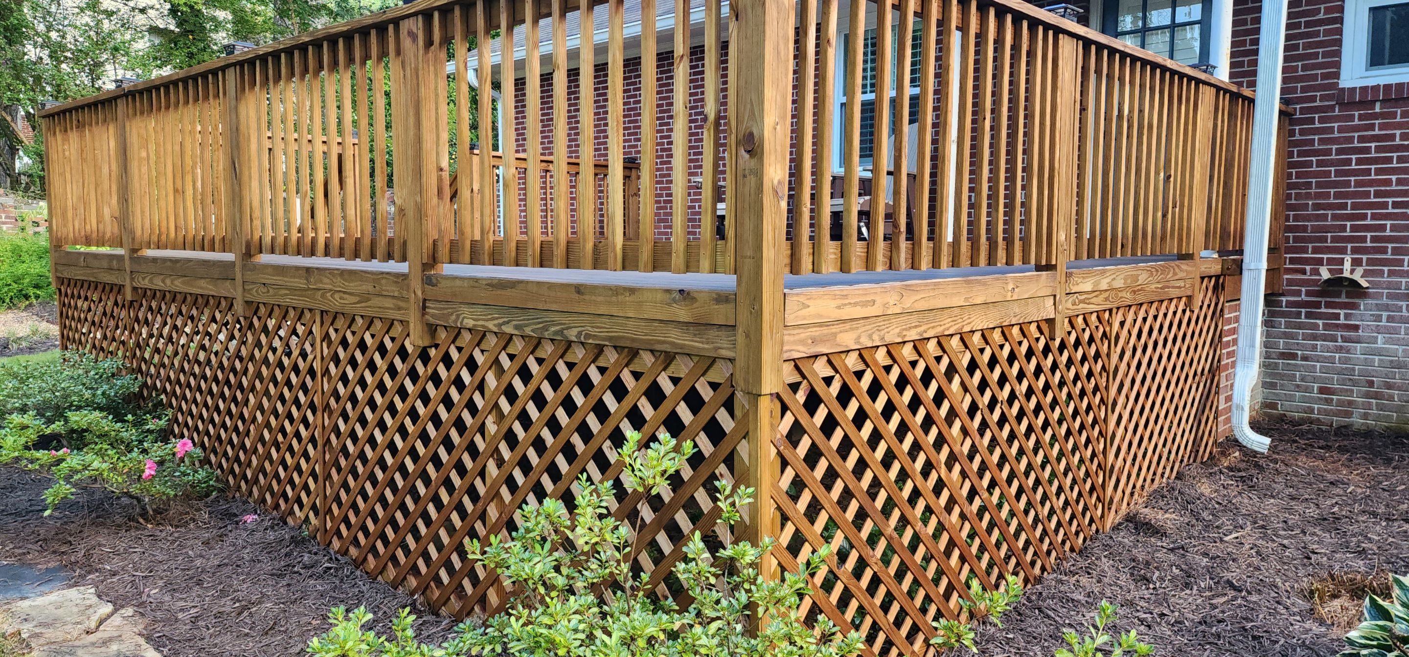 Deck Staining using Walnut by SSE by Titans of Timber Fence & Stain