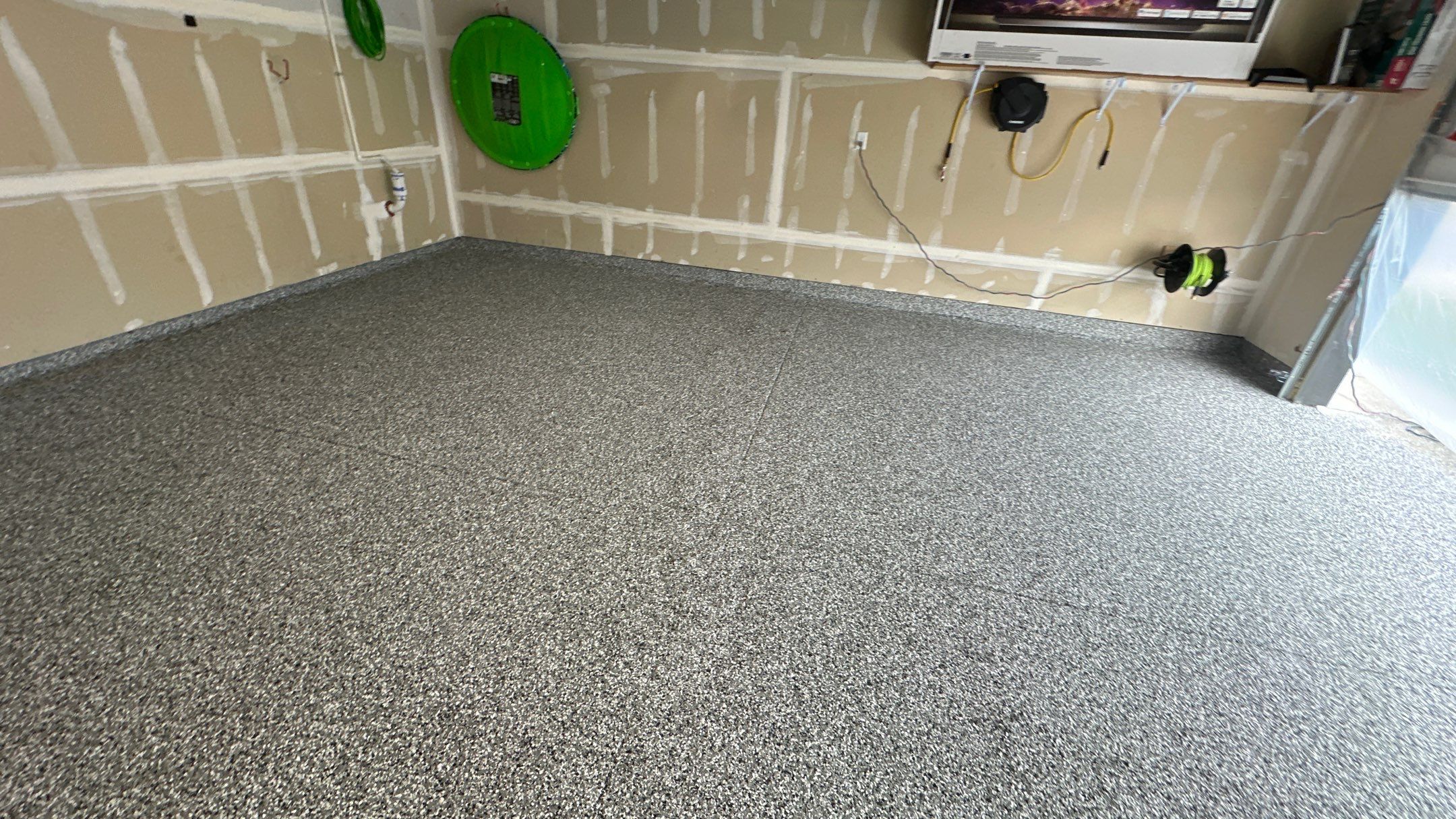 Garage Transformation using Smoke by Croc Coatings, LLC