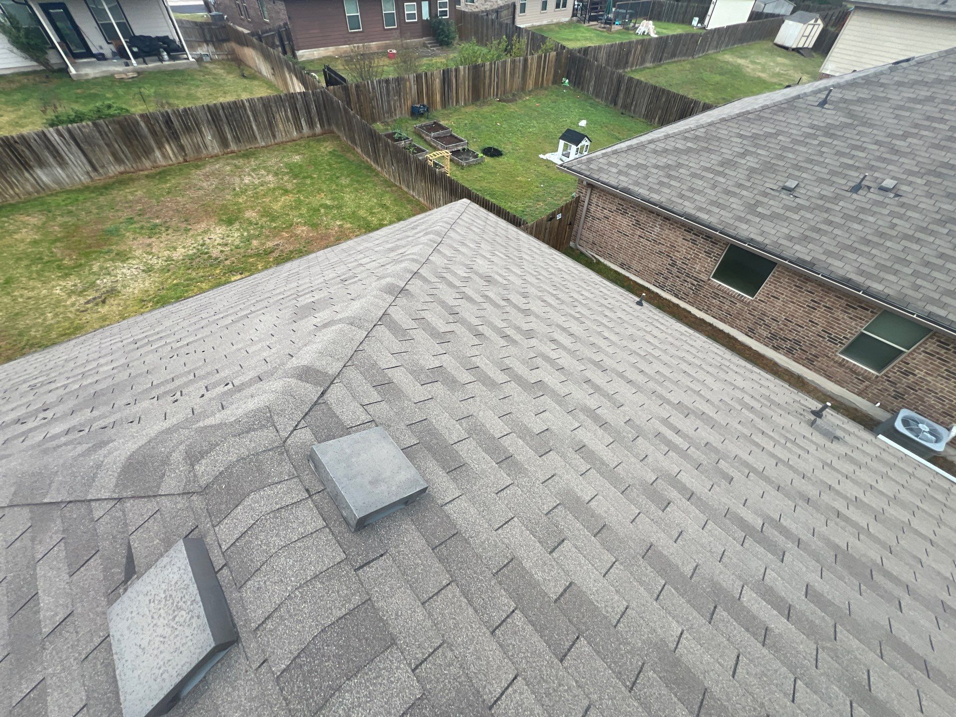 Residential Roofing Installation using IKO Nordic Class 4 Impact Resistant 30yr Architectural Shingles. Color: Castle Grey by WR Roofing Solutions