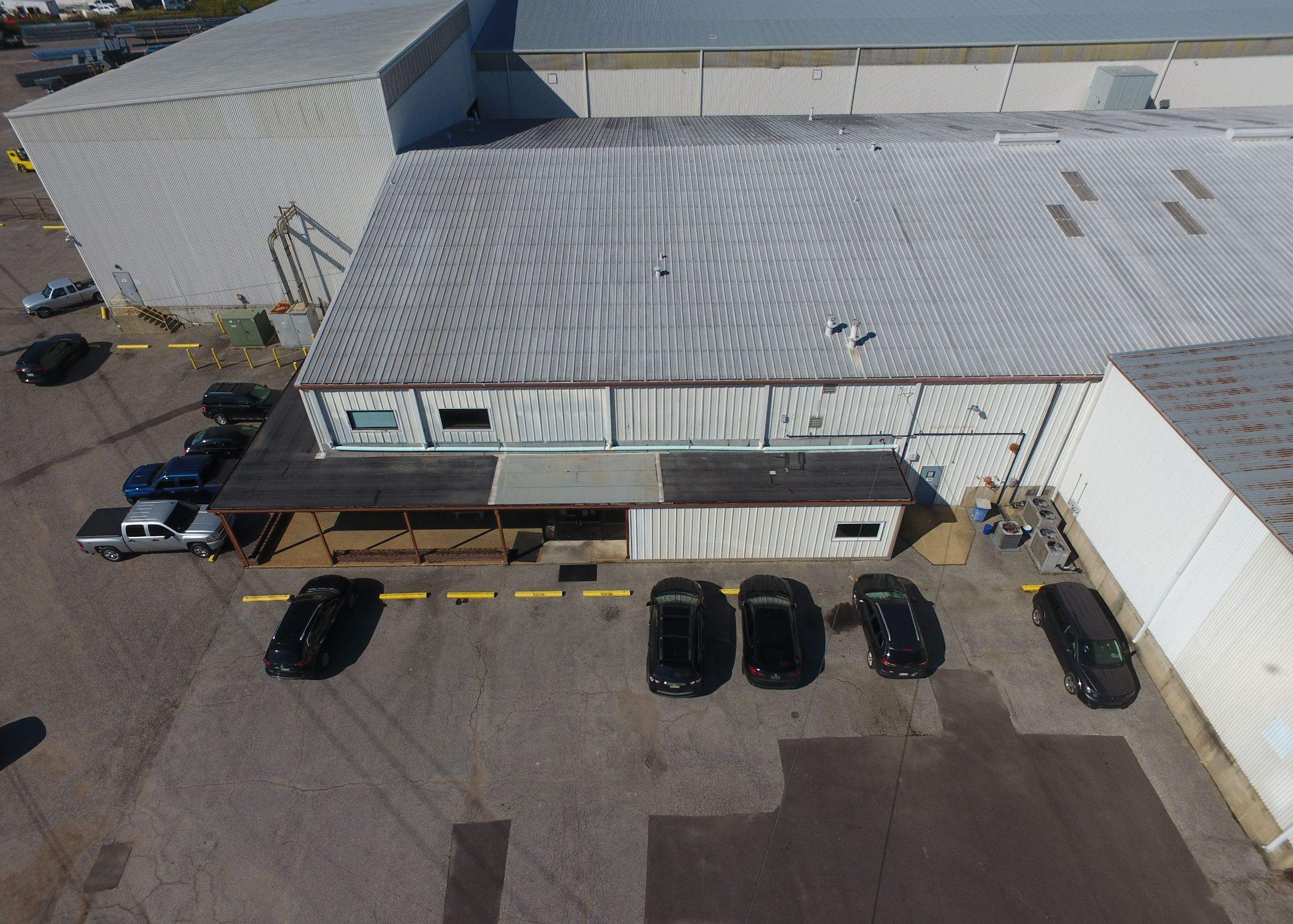 Commercial Metal Restoration System using Aldocoat Coatings by Hostetler Roofing