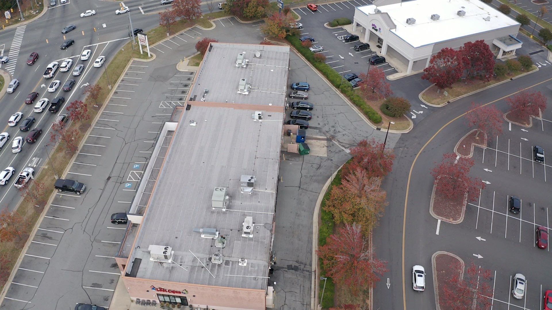 Commercial Coating using Poly Urerthane and Silicone Coating by Just In Time Roofing and Restoration