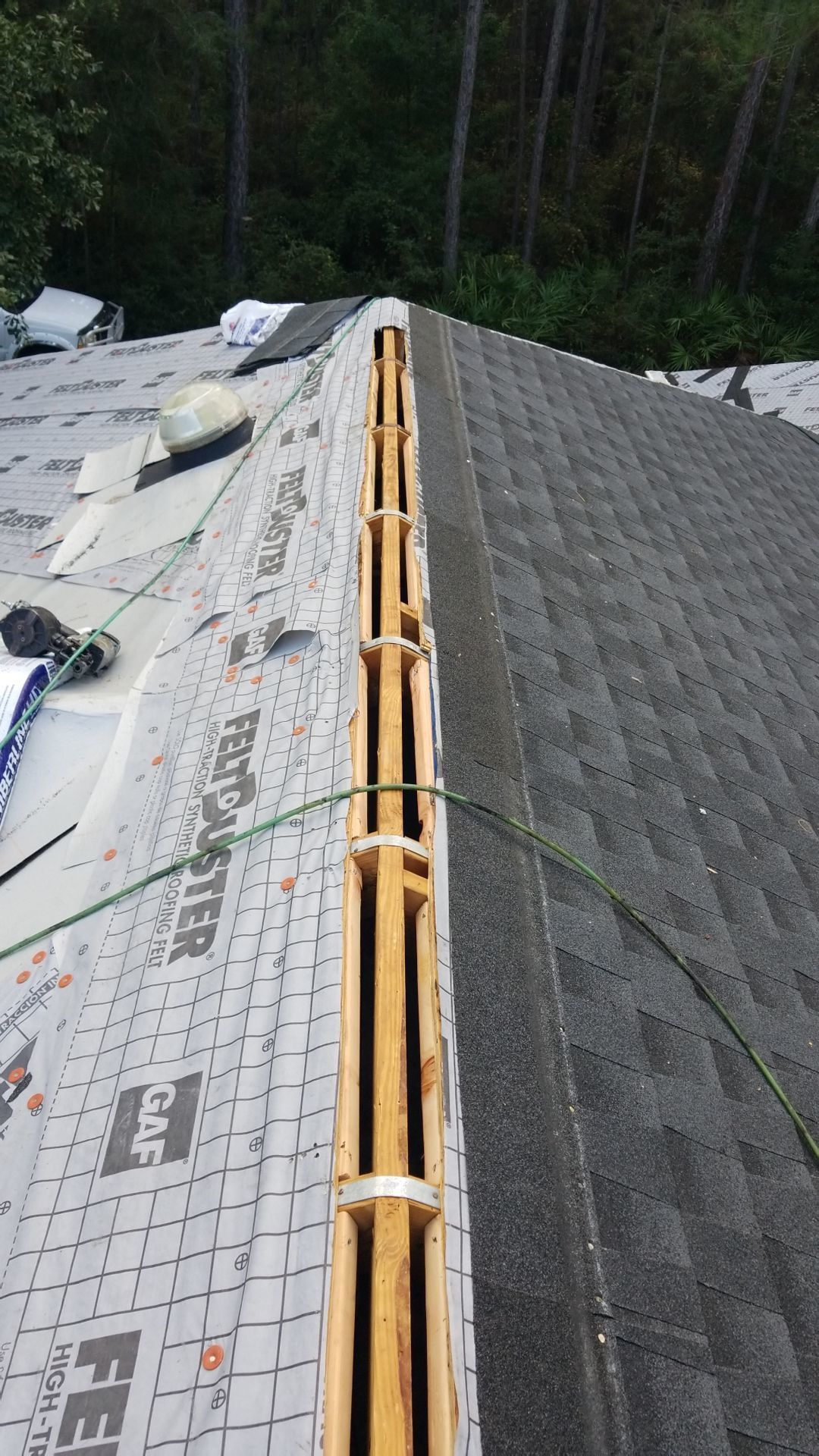Residential Roofing Installation using Roof Replacement by American Roofing & Construction LLC