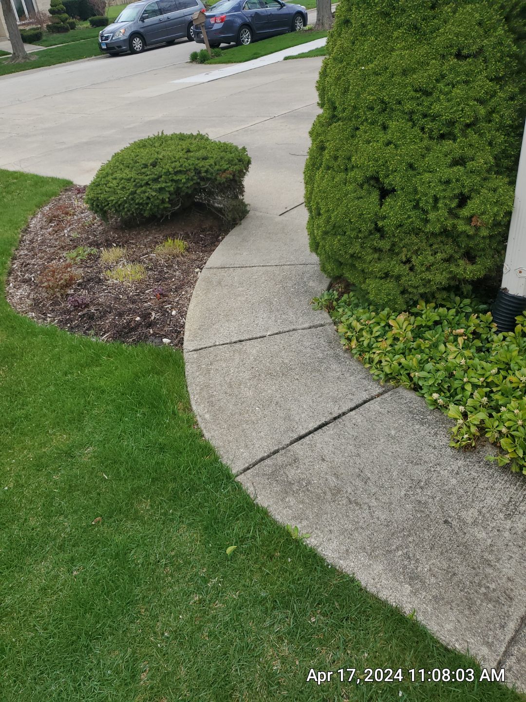 concrete patio and driveway cleaning by Northern Power Washing LLC.