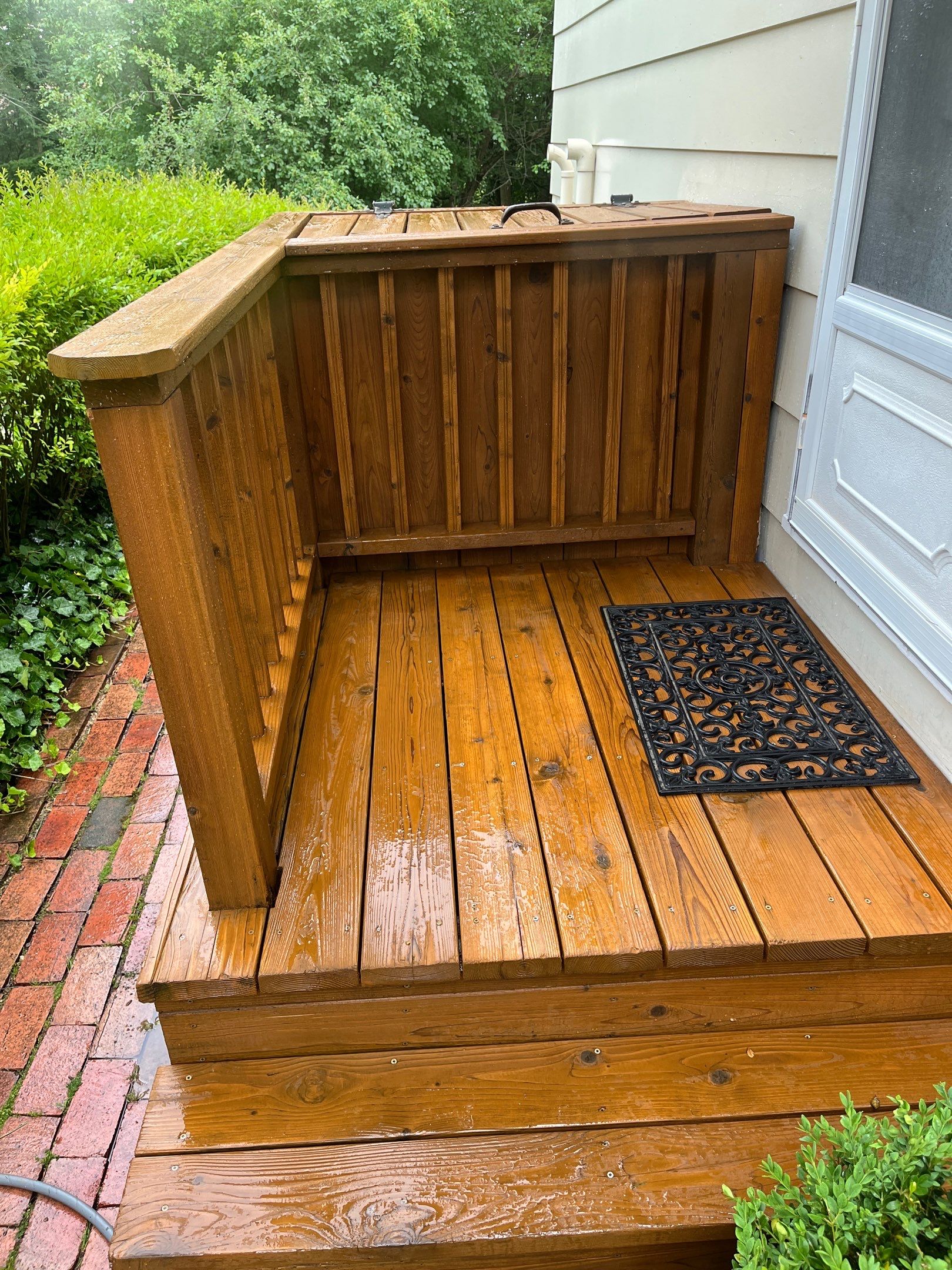 Wood cleaning and staining using Algaecide, soft wash soap by Northern Power Washing LLC.