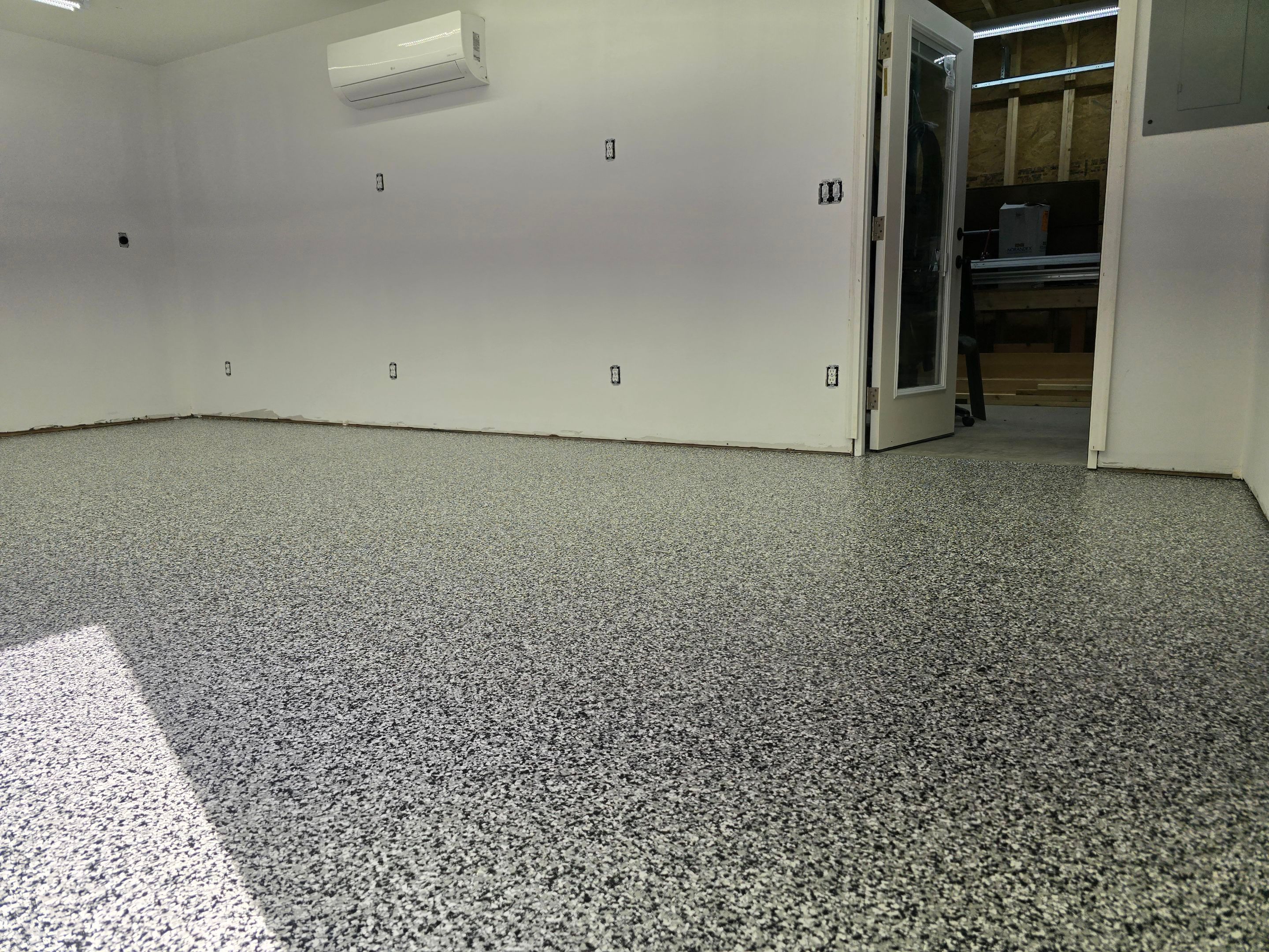 Garage using Domino by Elite Floor Solutions