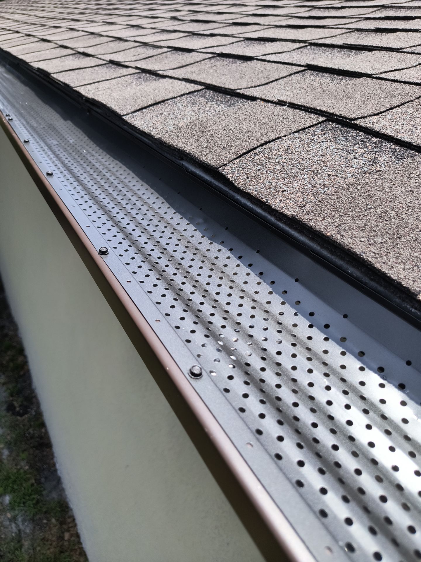 Custom Seamless Gutters and Downspouts for Large Homes in Tampa FL by Gutter Professor by Gutter Professors