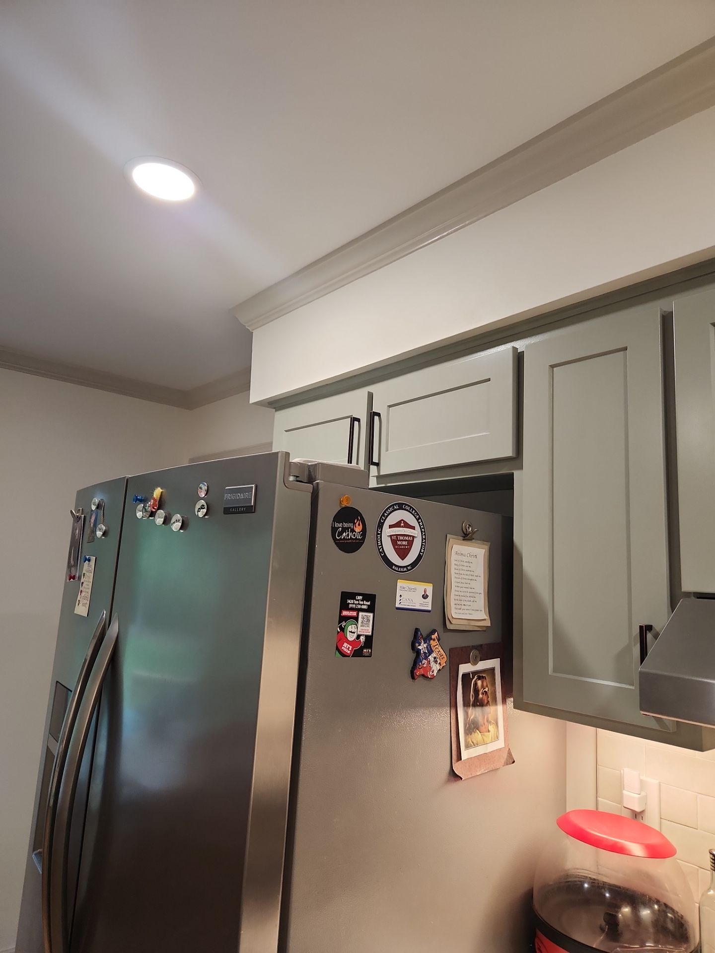 A Pathway to Personality – A Two-Tone Kitchen Transformation in Apex by Elite Remodeling and Design LLC