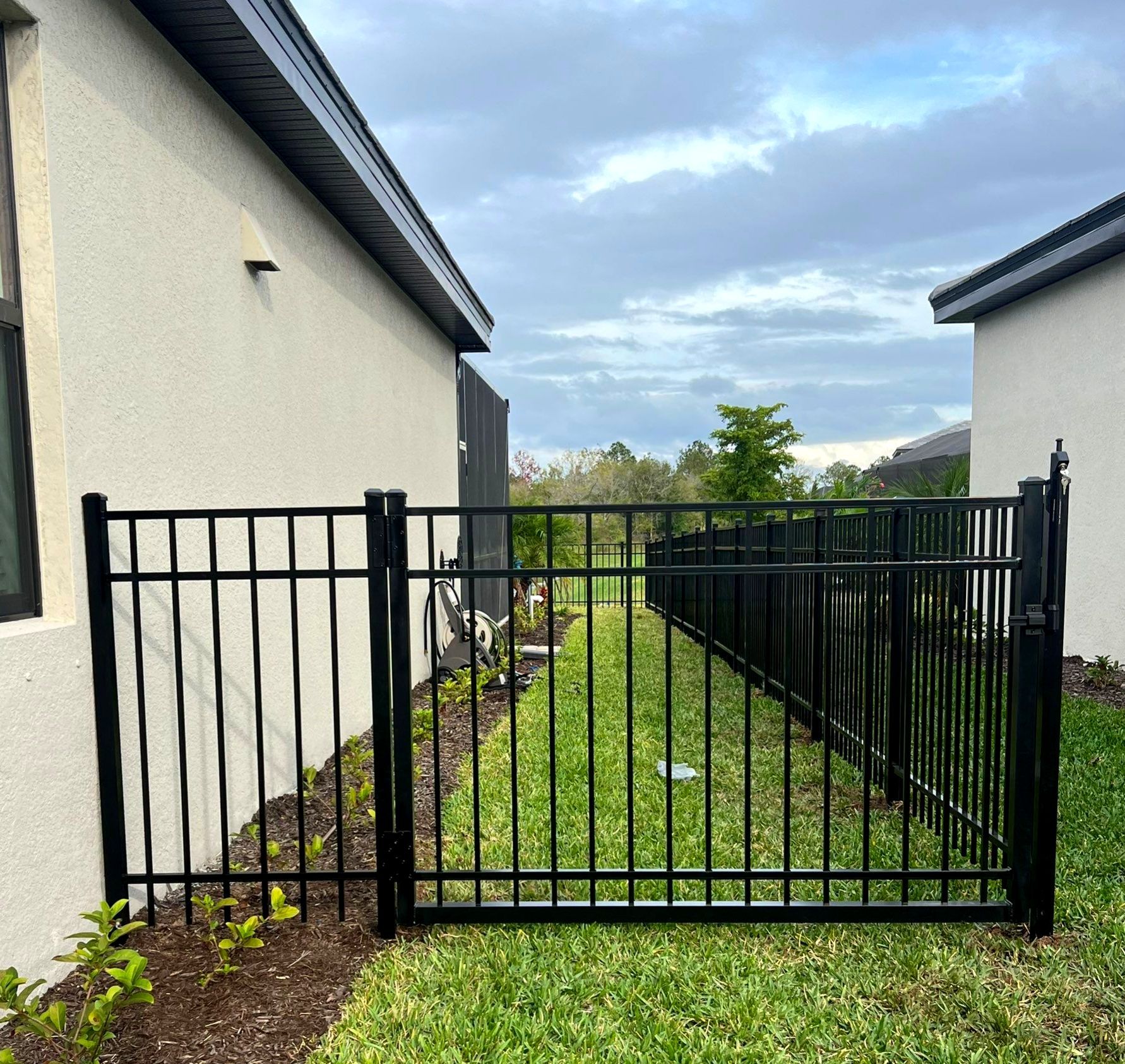 Aluminum Fence Installation using Black 3 Rail Aluminum Fence by Asap fence and gates, LLC