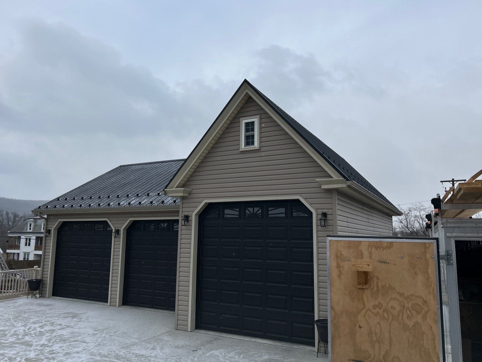 Textured Black Meal Roof by Esh Builders