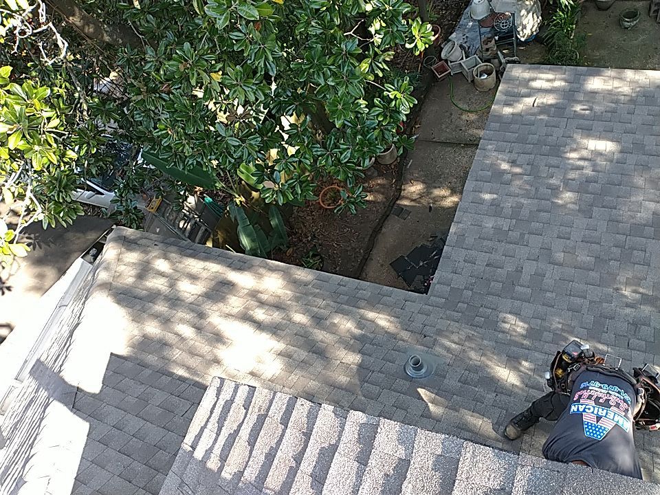 Residential Roofing Installation using Roof Replacement by American Roofing & Construction LLC