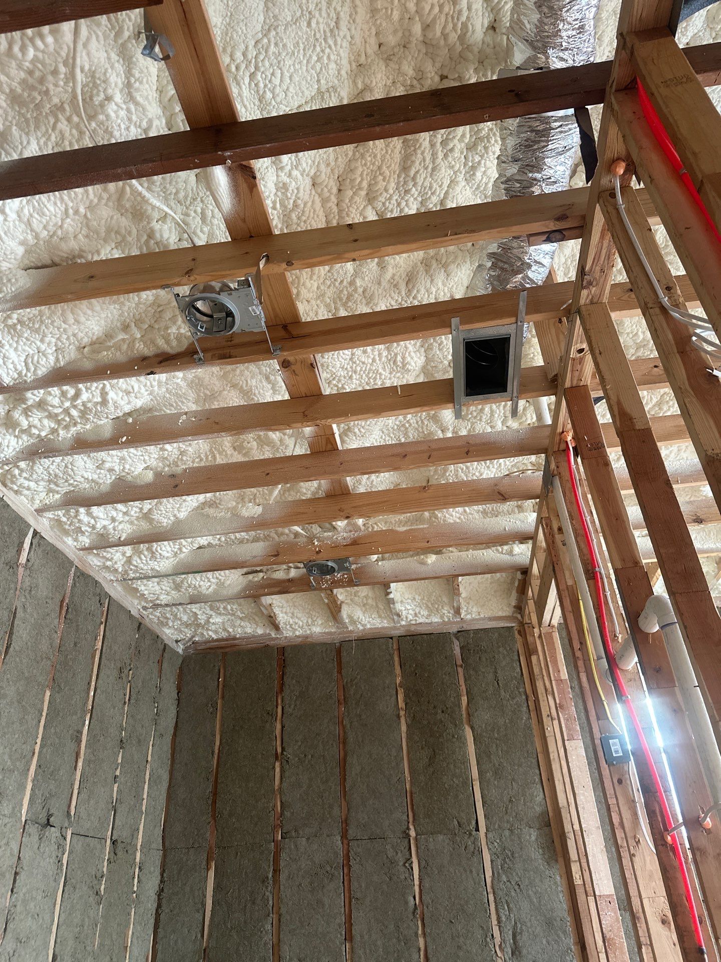 Open cell spray foam & rockwool job completed in Dallas TX by Apex Insulation Solutions
