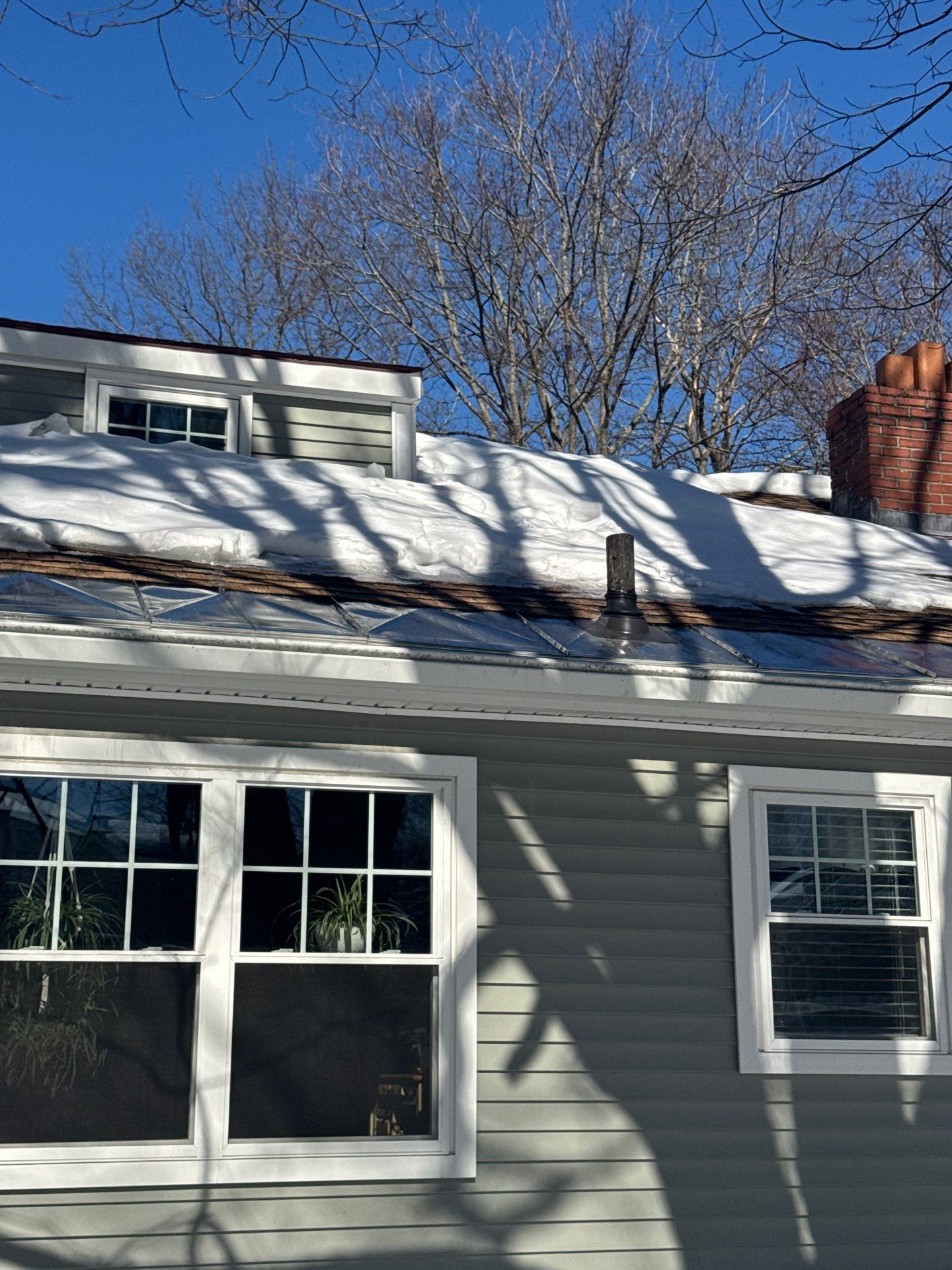 Snow/Ice Belt & Ice Dam Removal Project in Woburn by Mighty Dog Roofing of Greater Middlesex County