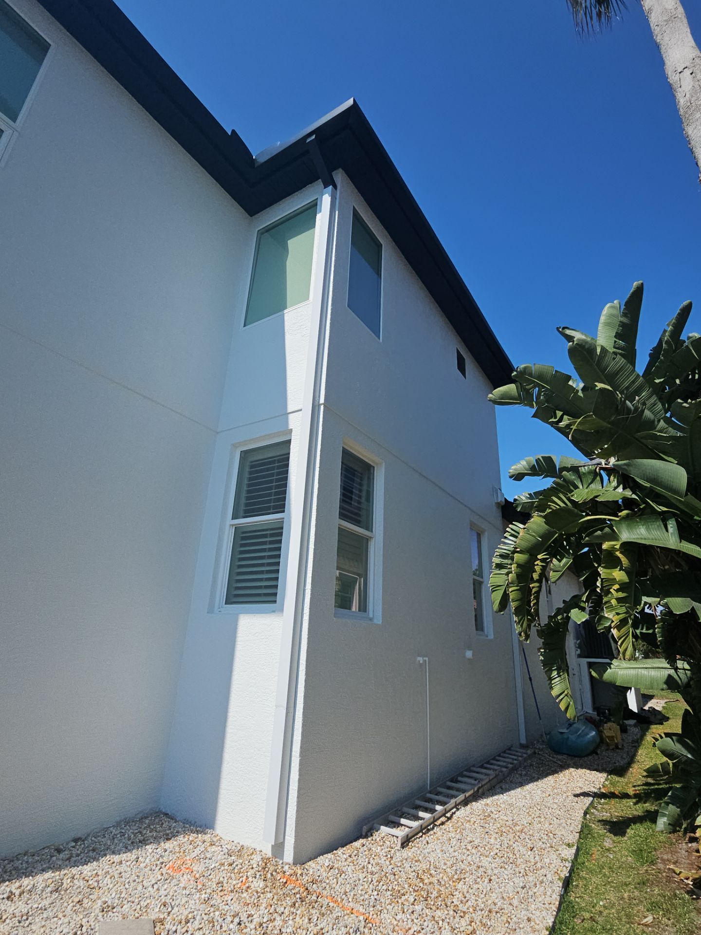 Soffit and Fascia Installation and black seamless gutters in Sarasota FL by Gutter Professors