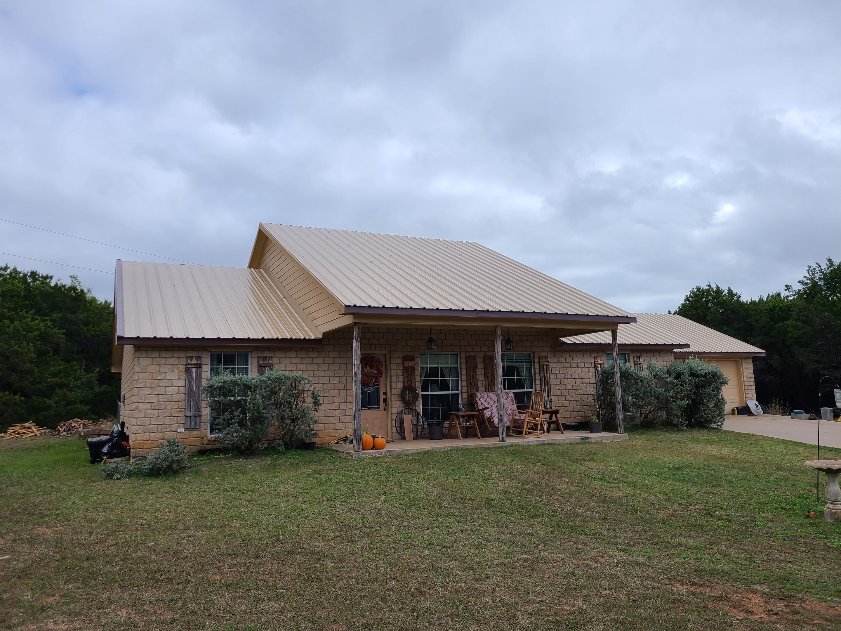 Residential Roofing Installation using PBR Metal Roof by Harvey Roofing & Construction