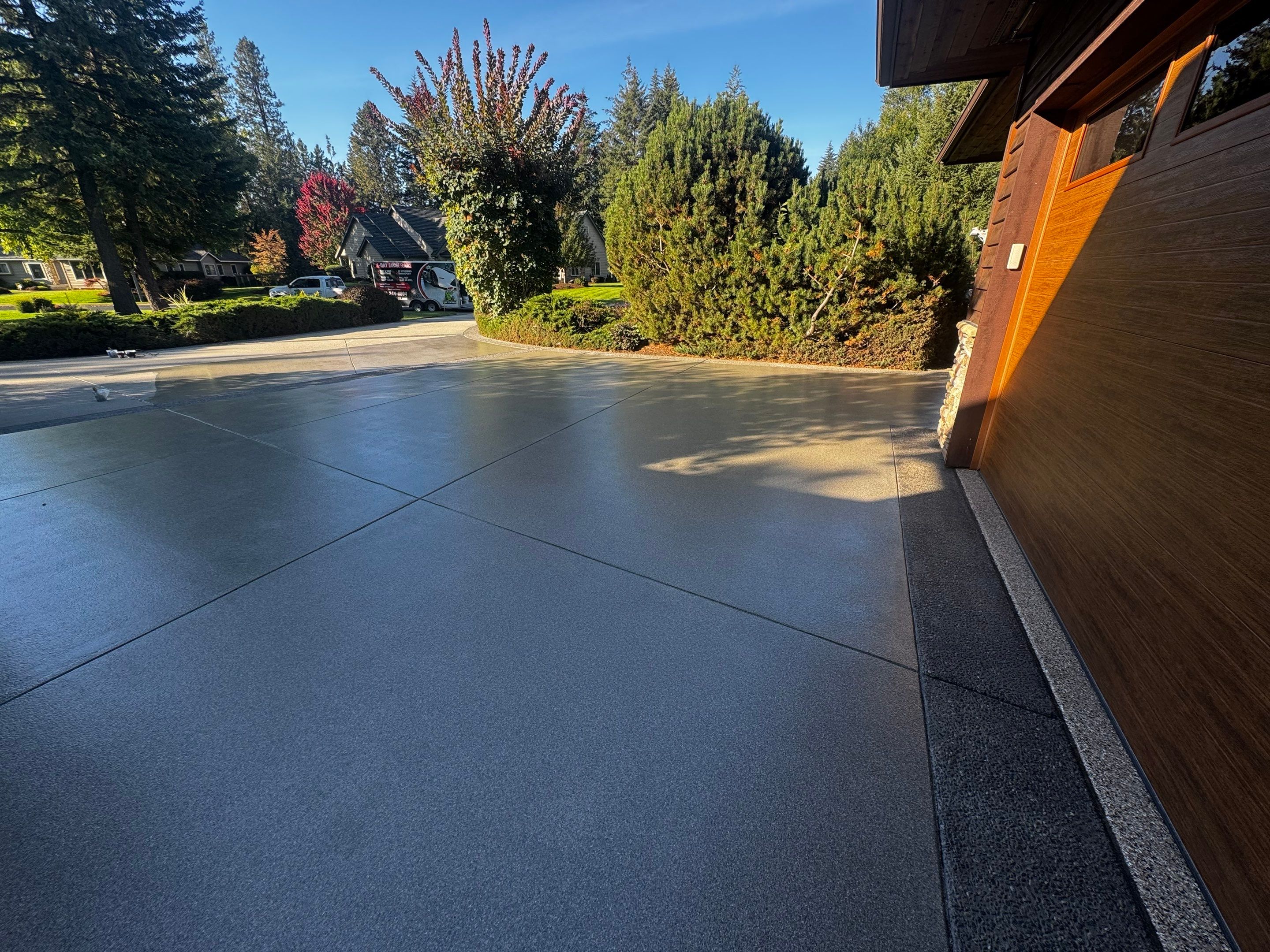 Driveway using Penntek Evolution System and Trail Mix 1/8" Chip by Croc Coatings, LLC