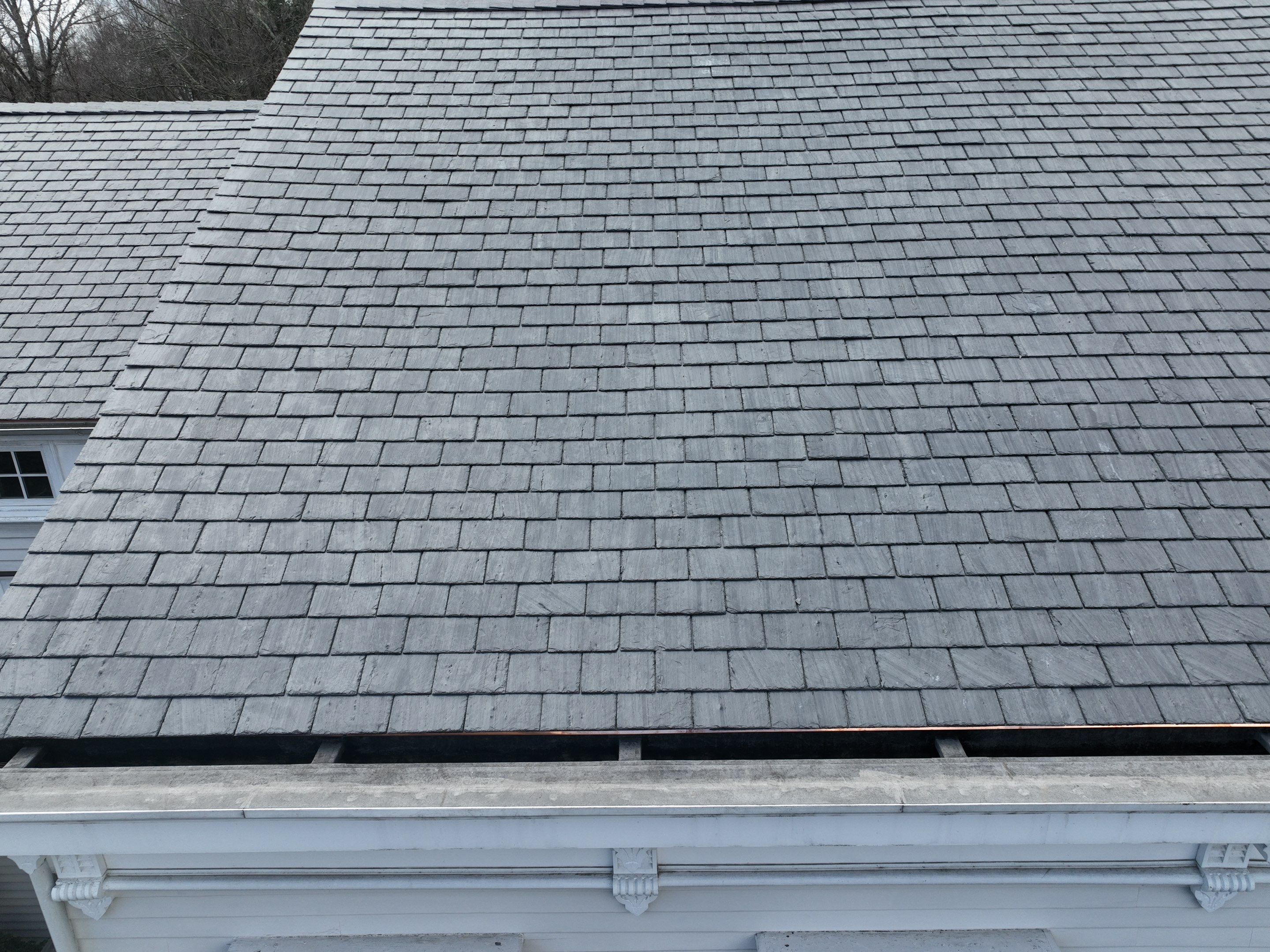 Residential Roofing Installation using Vermont Slate by A Plus Exterior