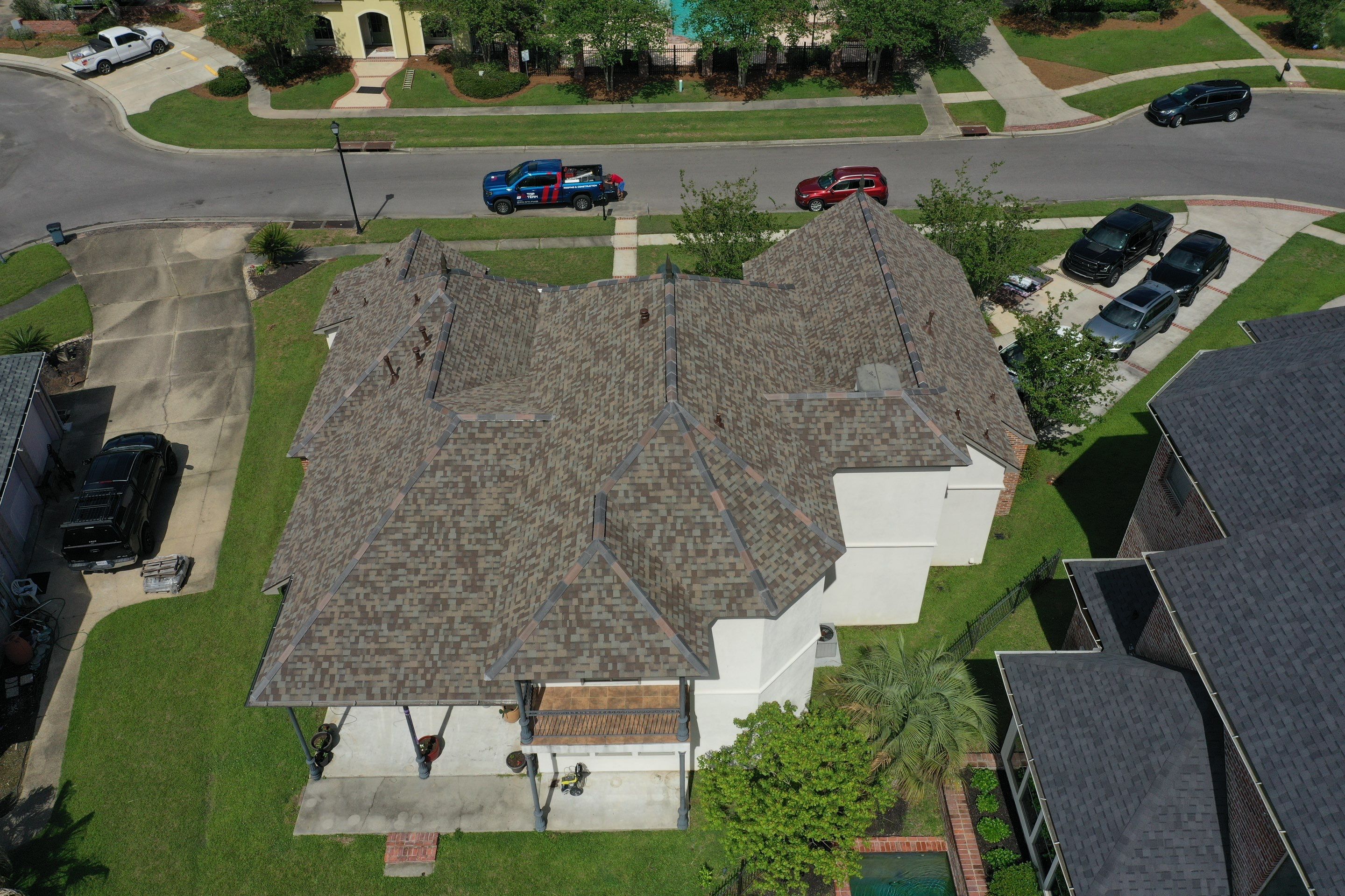 Owens Corning Duration Driftwood with Hecker Ridge Tile by Top Team Construction