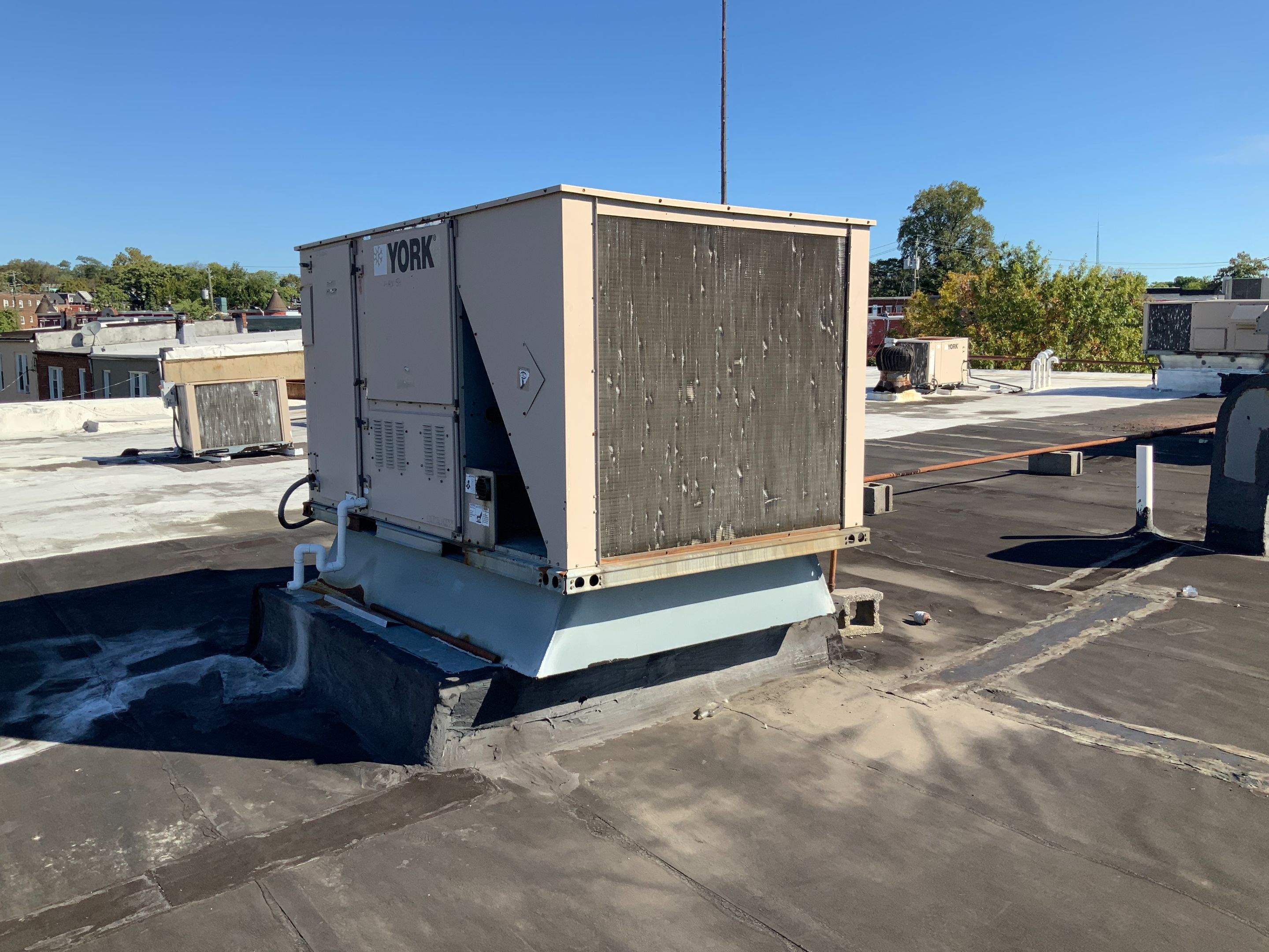 Commercial Roofing Repair using new Flashing by Alpha Design Services
