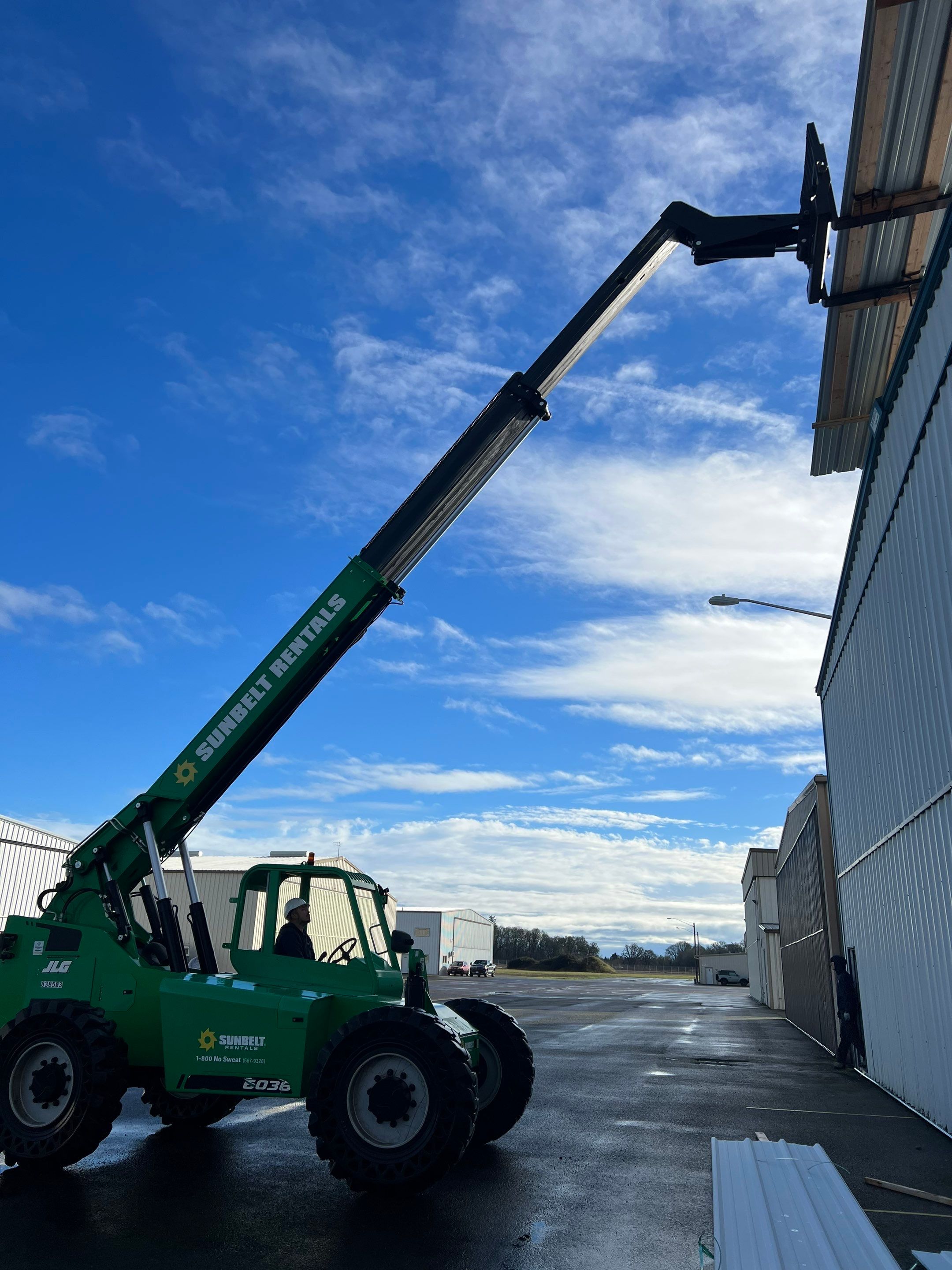 Airport Hanger Metal Roof Replacement and Insulation by Villegas Remodeling, LLC