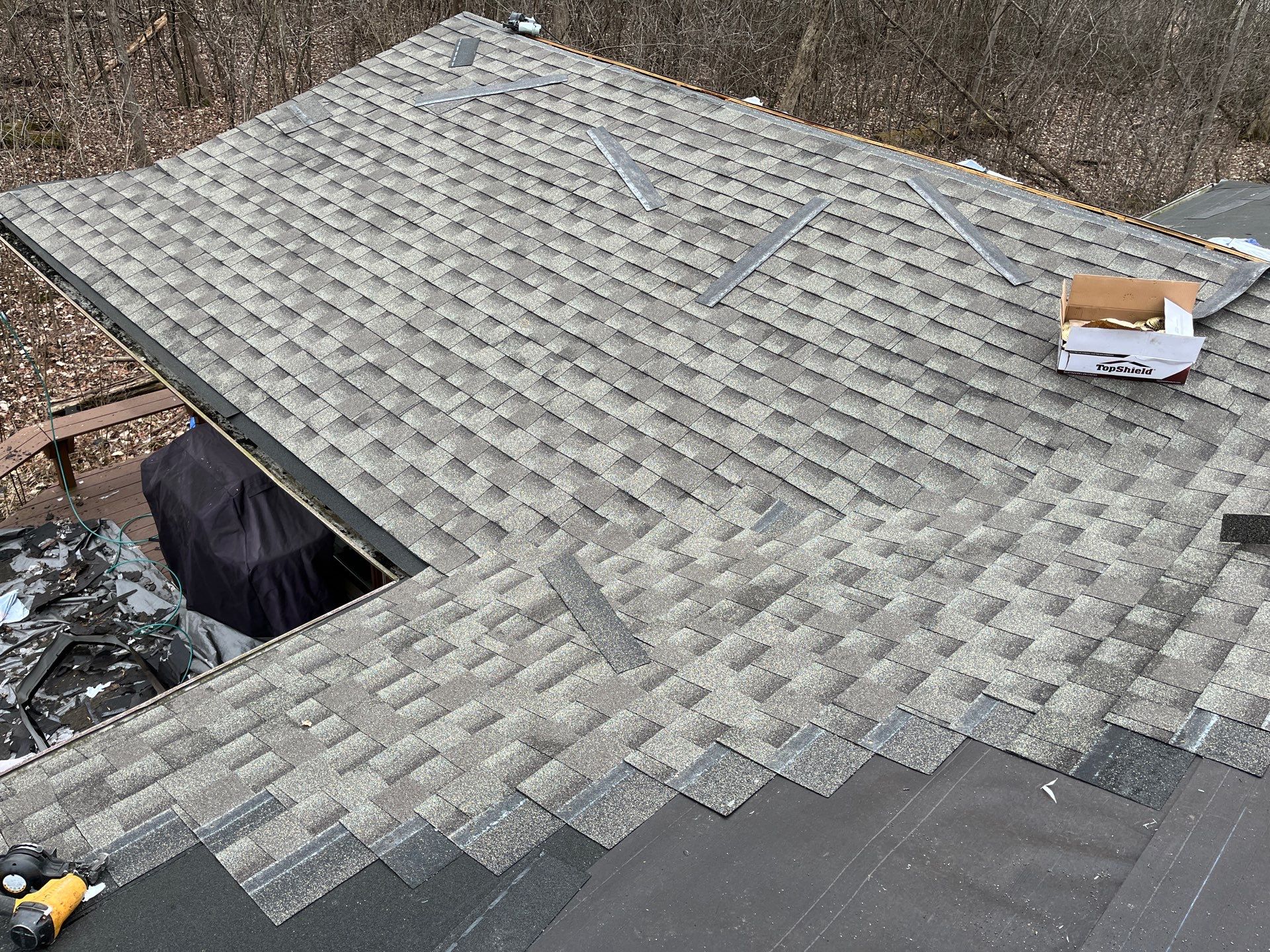 Asphalt Roof Replacement by Custom Installations