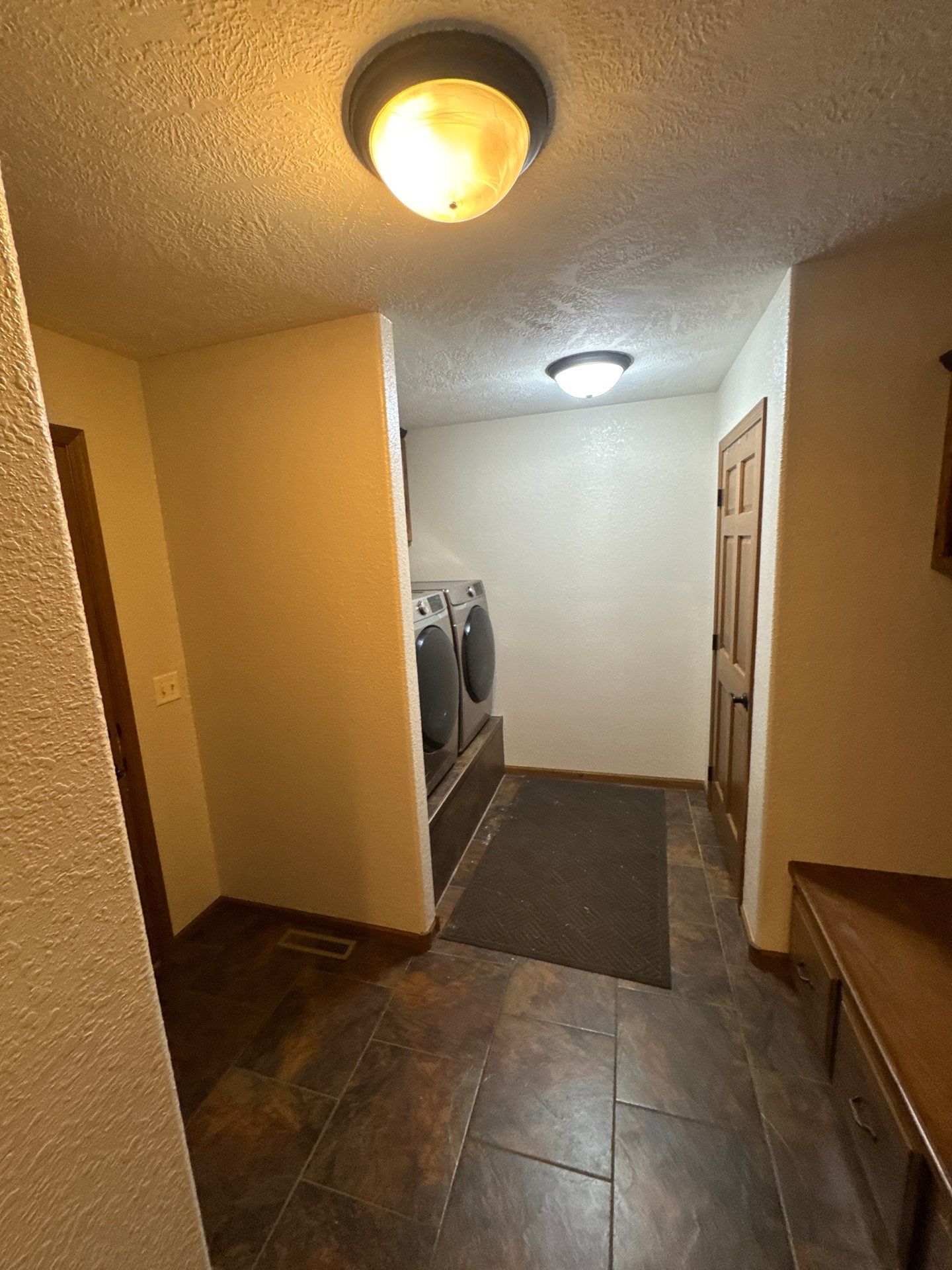 Comprehensive Interior Painting and Drywall Surface Repairs in Brandon by Select Painting, Coatings & Garage Cabinets