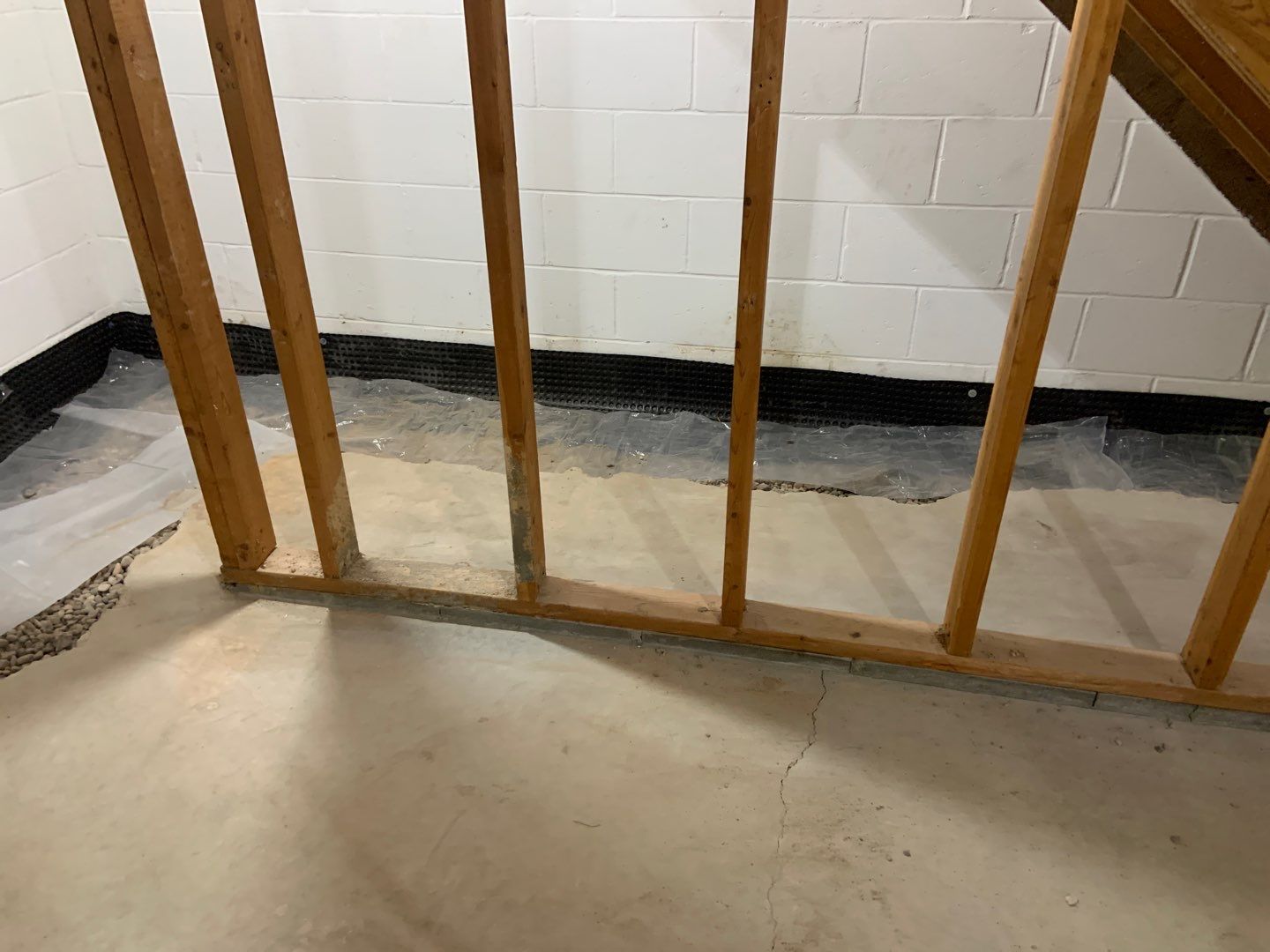 Correcting an Improper Installation for Alan in Chanhassen by Waterproofing Northeast