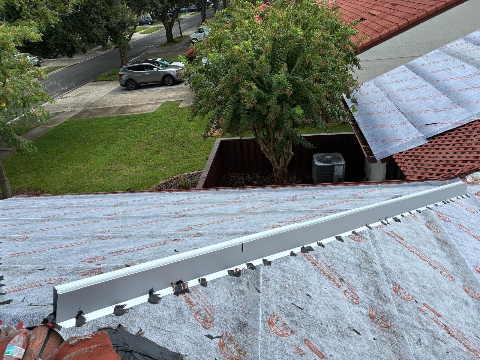Residential Tile Roof Replacement and Gutter Installation in Winter Park by Pinnacle Roofing Group