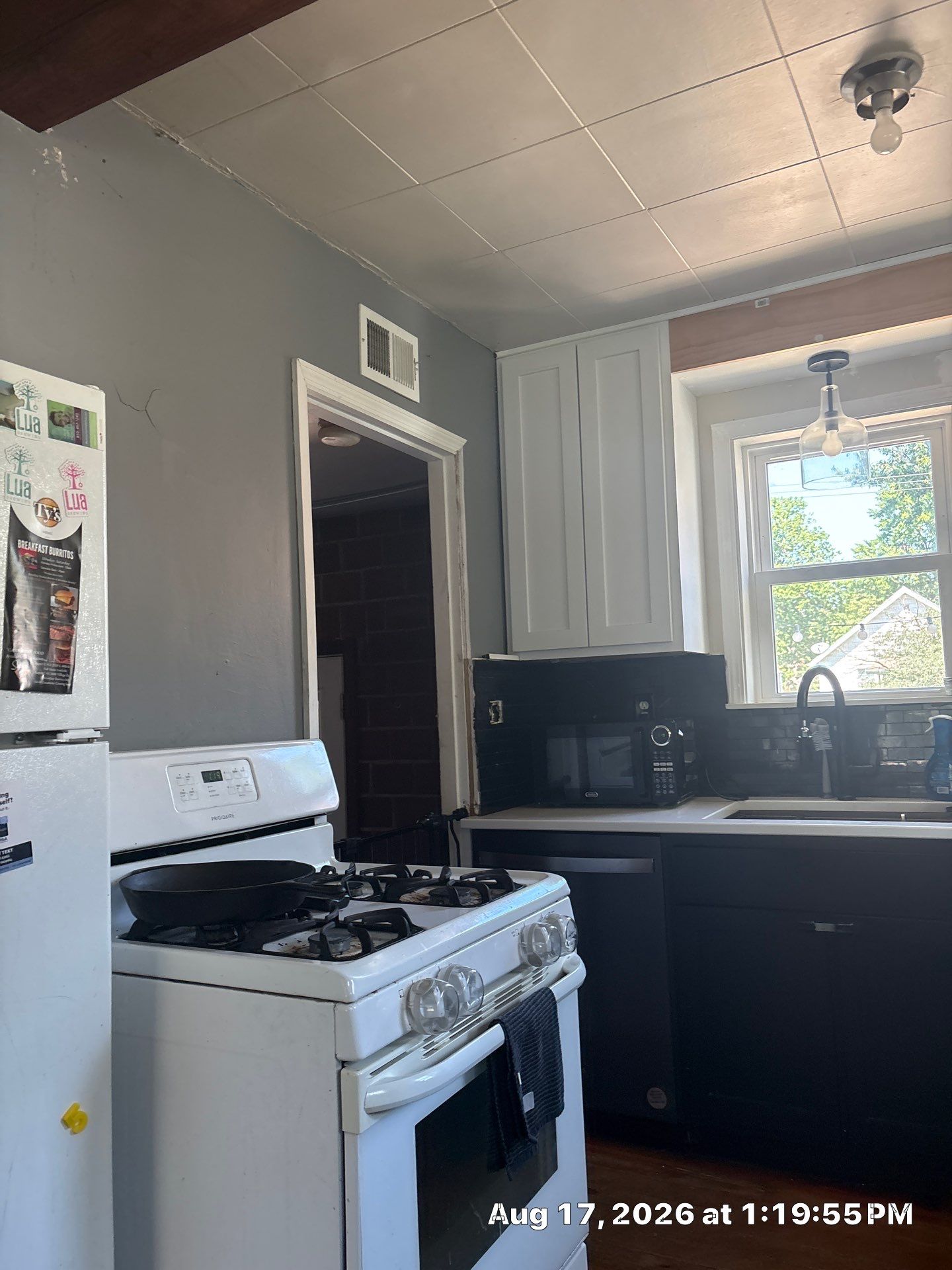 Modern Lincoln Kitchen Remodel with Two-Tone Cabinetry by CompanyCam Sales Demo