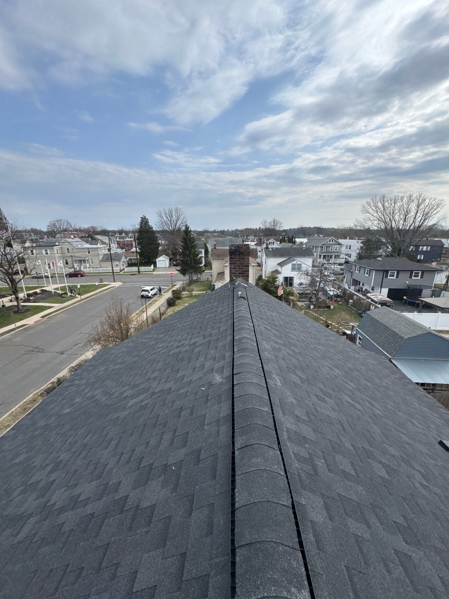 Onyx Black Shingles by Reimagine Roofing