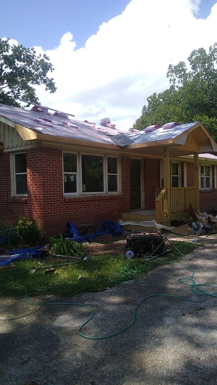 Residential Roofing Installation using Roof Replacement by American Roofing & Construction LLC