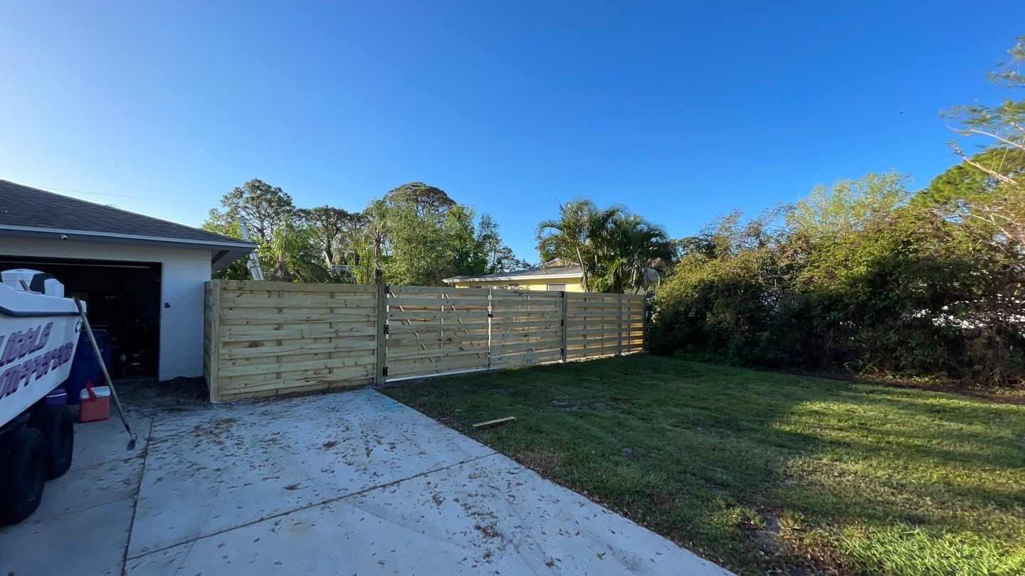 Wood Fence Installation using Horizontal Shadowbox Wood Privacy Fence by Asap fence and gates, LLC