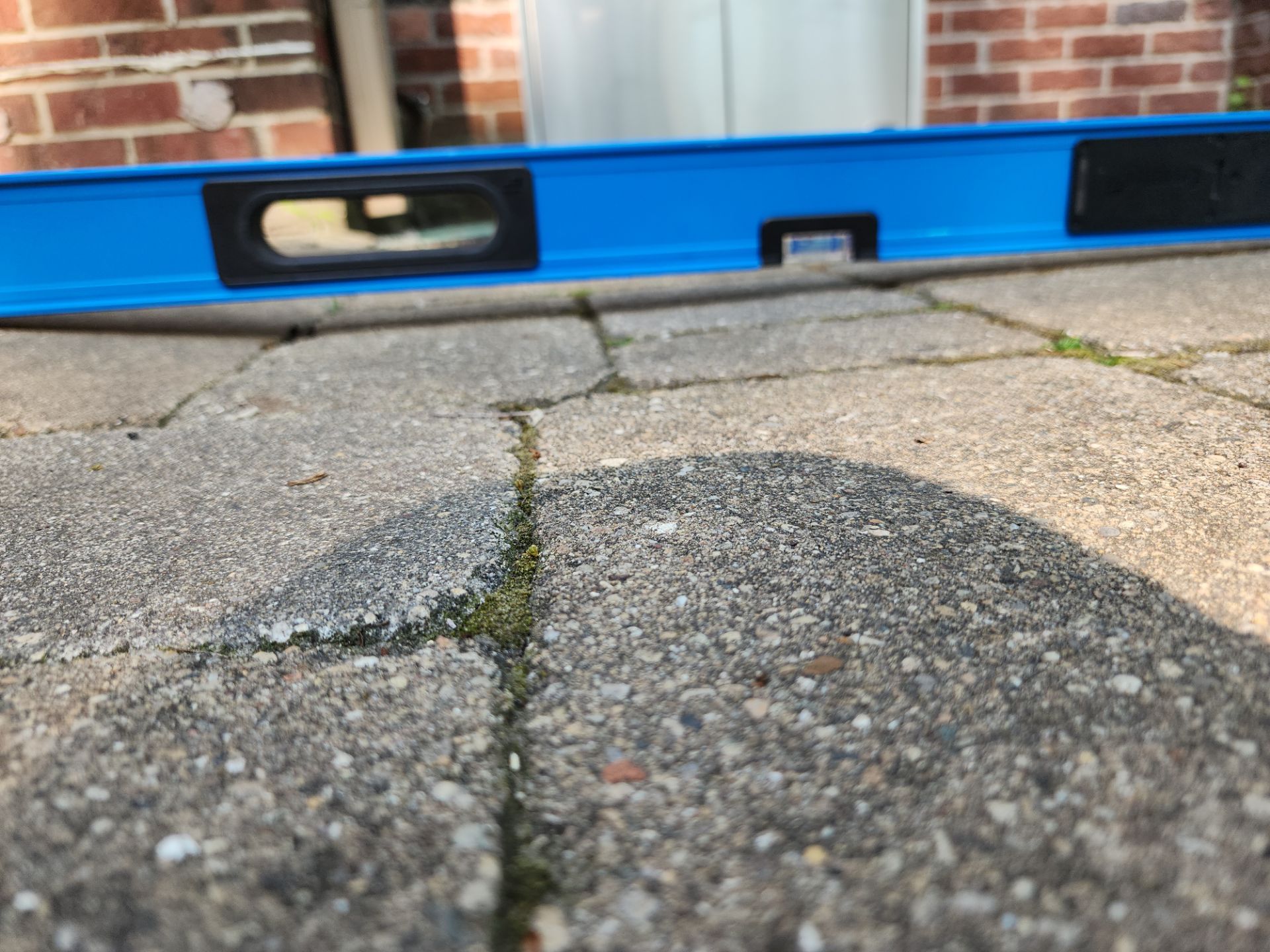 Brick paver repair, clean, seal and poly sanding by Northern Power Washing LLC.