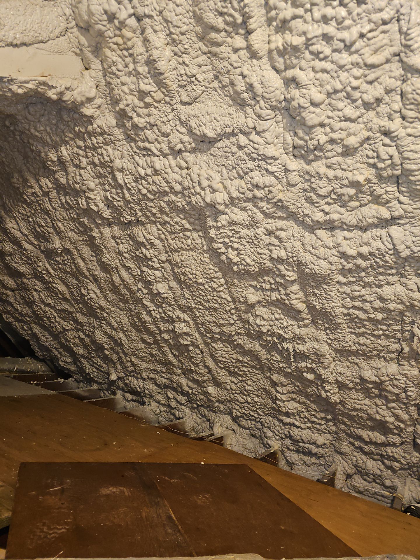 Attic Retrofit using open cell spray foam by NYS Foam & Energy