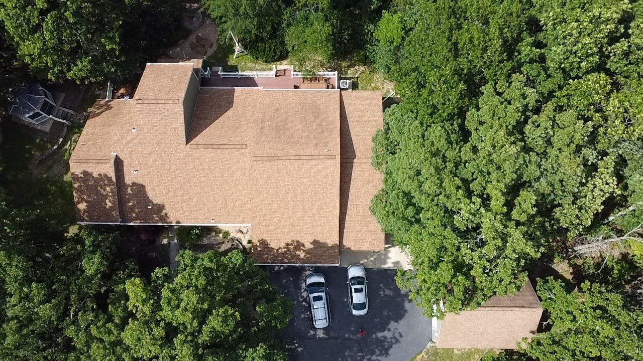 Residential Roof + Gutters & Downspouts & Gutter Guards Install  by Titan Commercial & Residential Roofing 