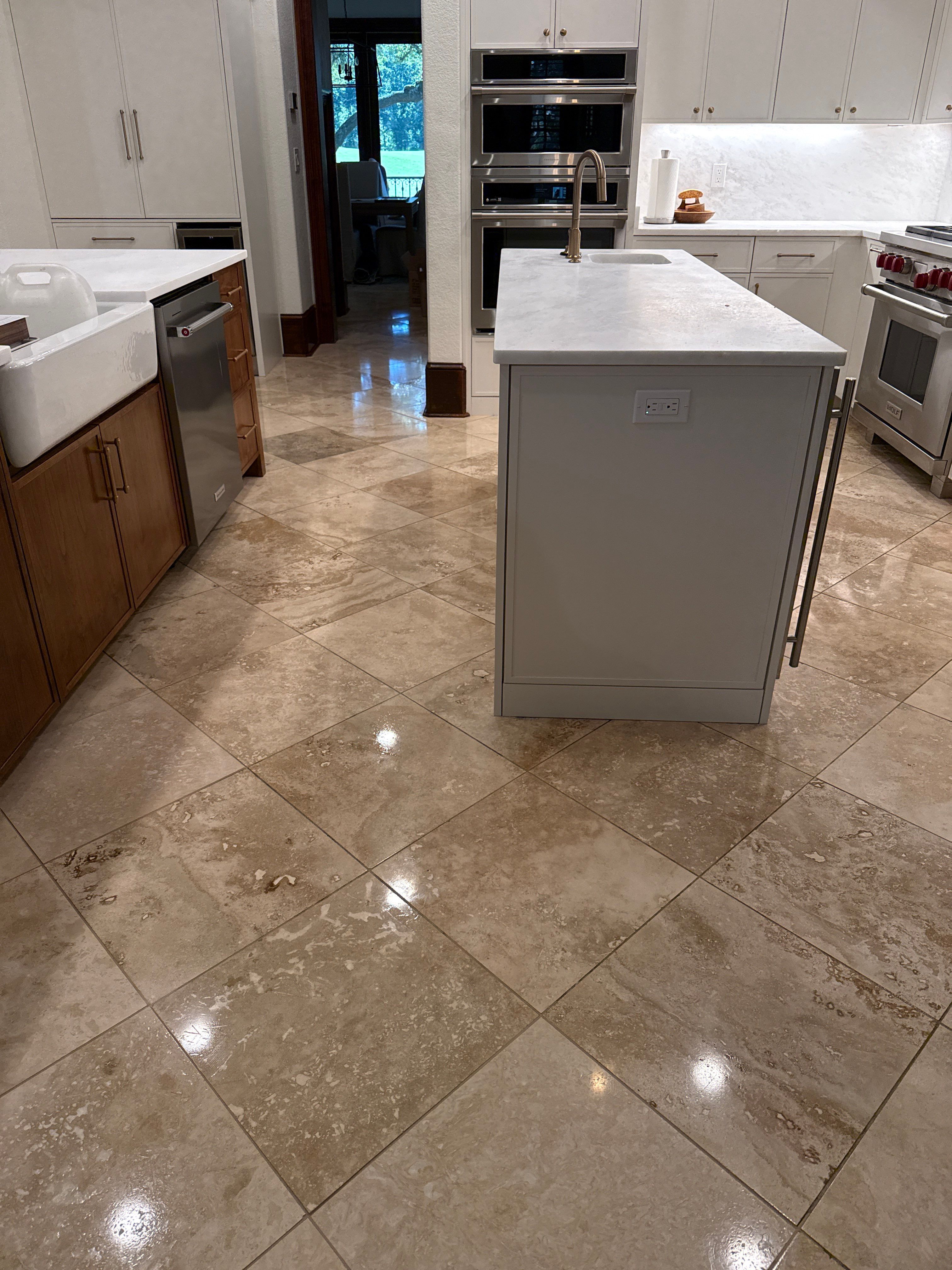 Polished Travertine Floor Restoration for Gulf Shores Residence by Cornerstone Hard Surface Restoration