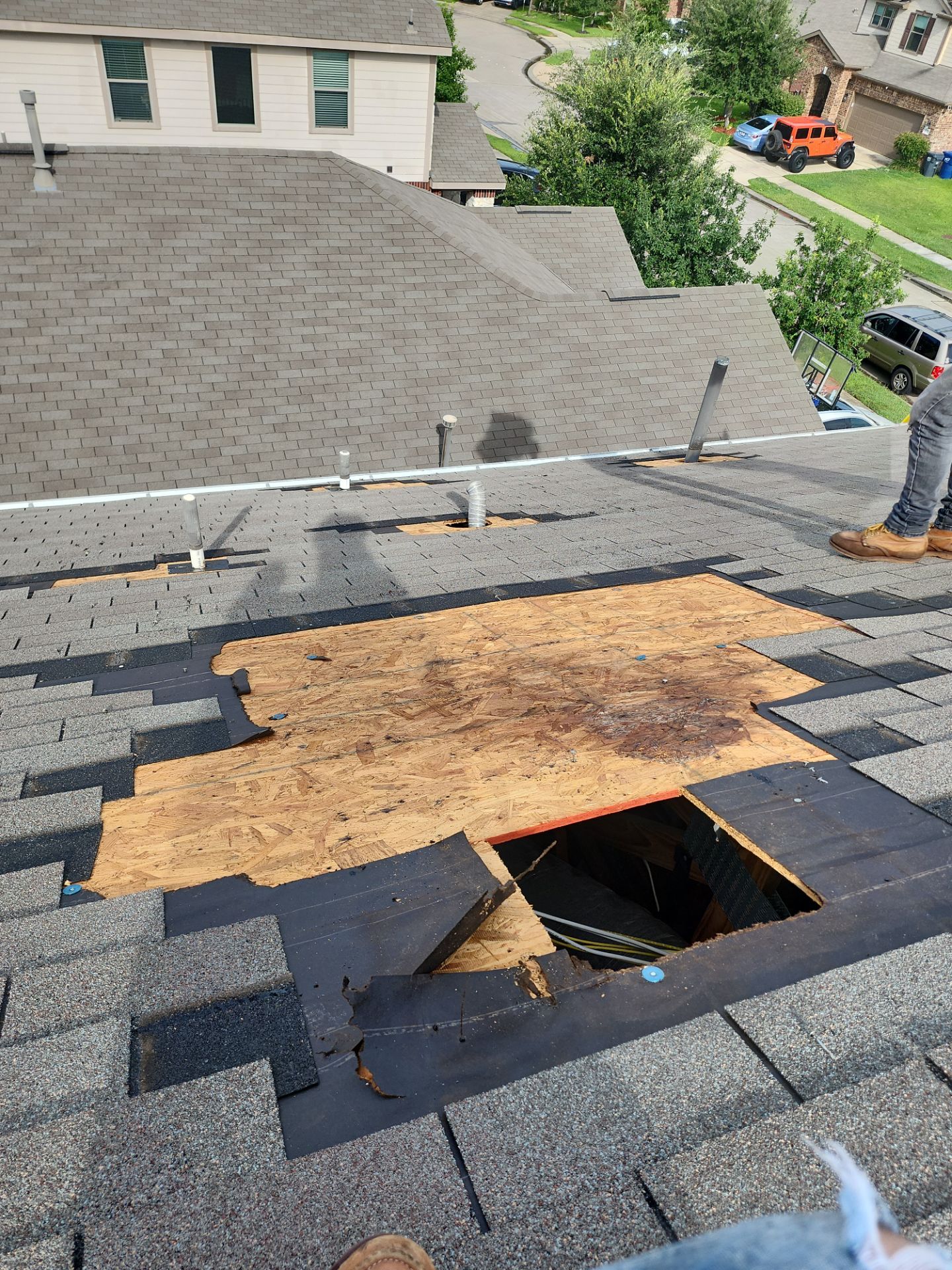 Hail Damage using Owen's Corning Duration (Lifetime) Shingles by Roof Repair Company