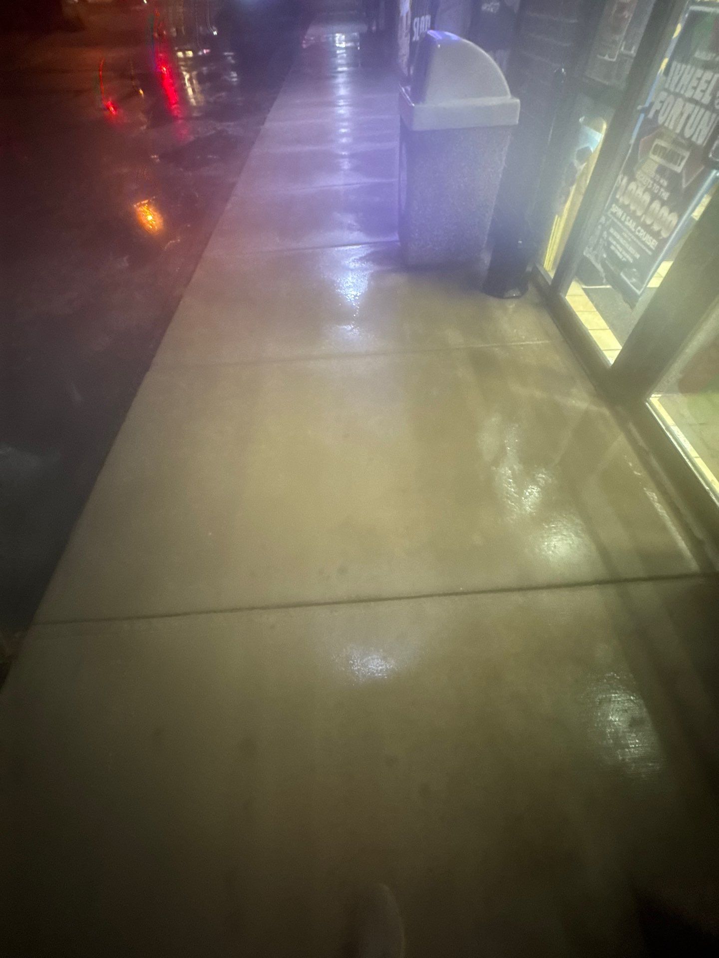 Commercial sidewalk cleaning. by Northern Power Washing LLC.