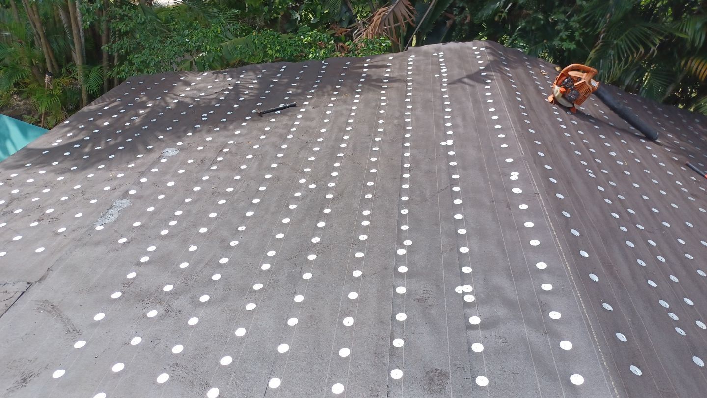 Residential Roofing Installation using 1" Nail strip metal roof by BLUES BROTHERS ROOFING